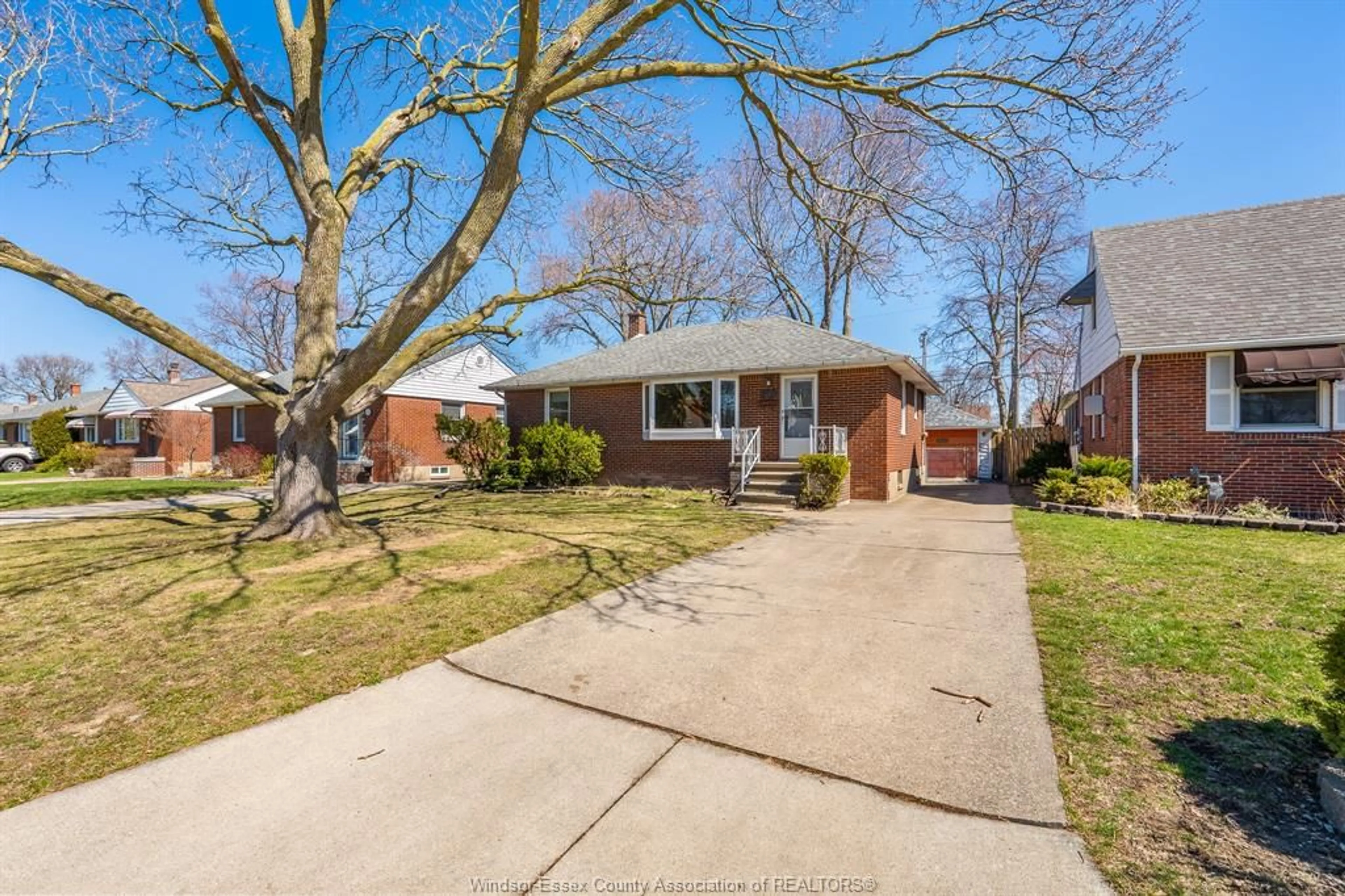 Home with brick exterior material, street for 1024 Isabelle Pl, Windsor Ontario N8S 3B2