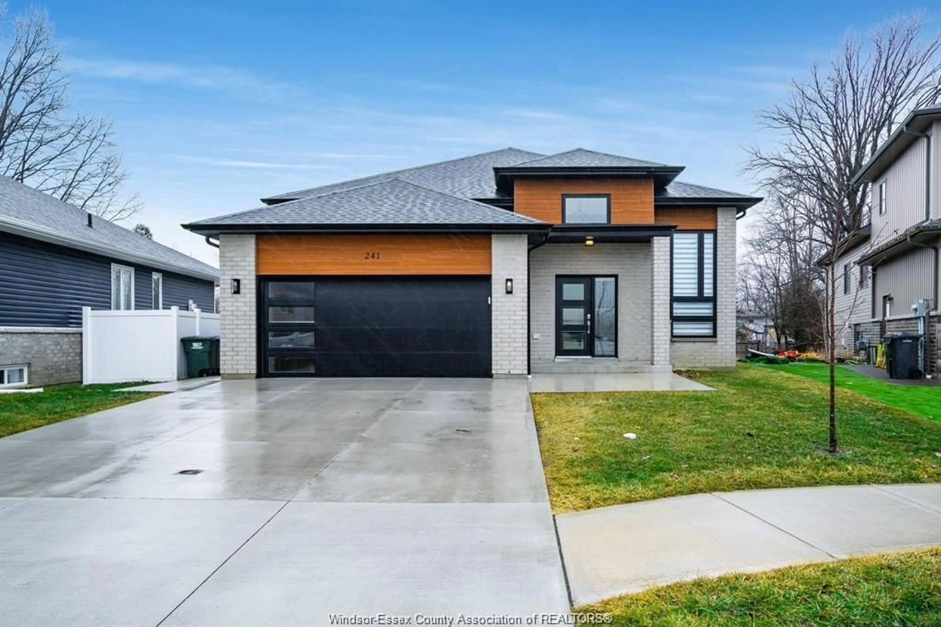 Home with brick exterior material, street for 241 ROBINSON Ave, Essex Ontario N8M 0A8