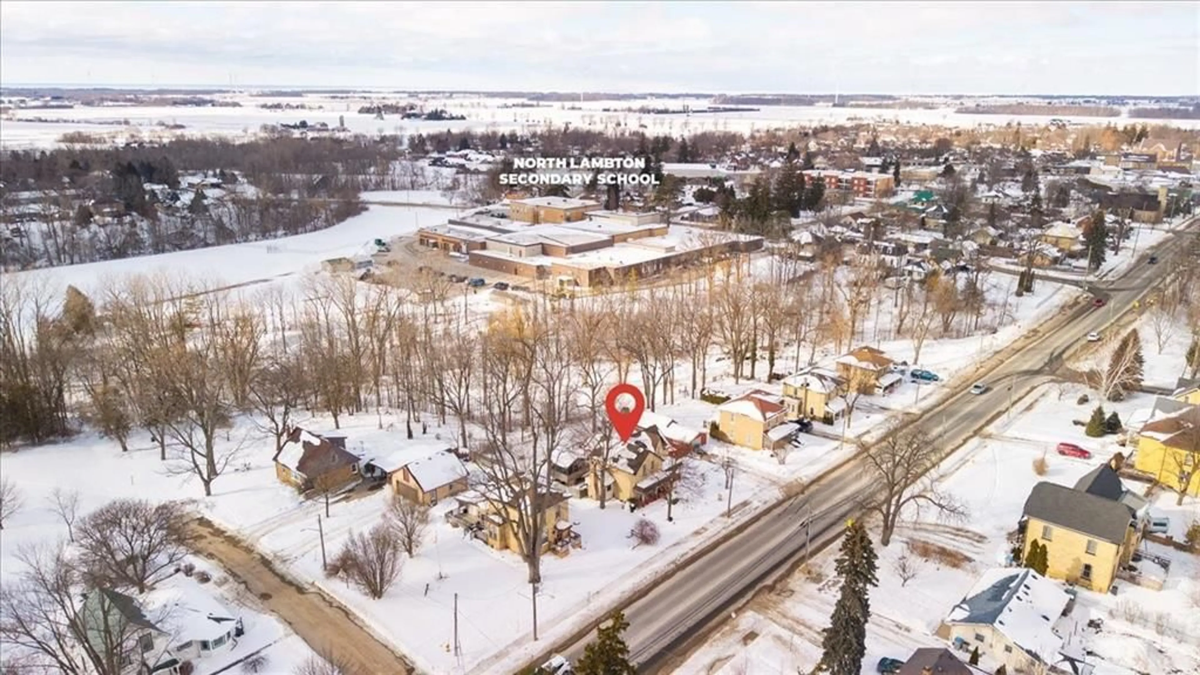 A pic from outside/outdoor area/front of a property/back of a property/a pic from drone, street for 54 MAIN St, Lambton Shores Ontario N0N 1J0