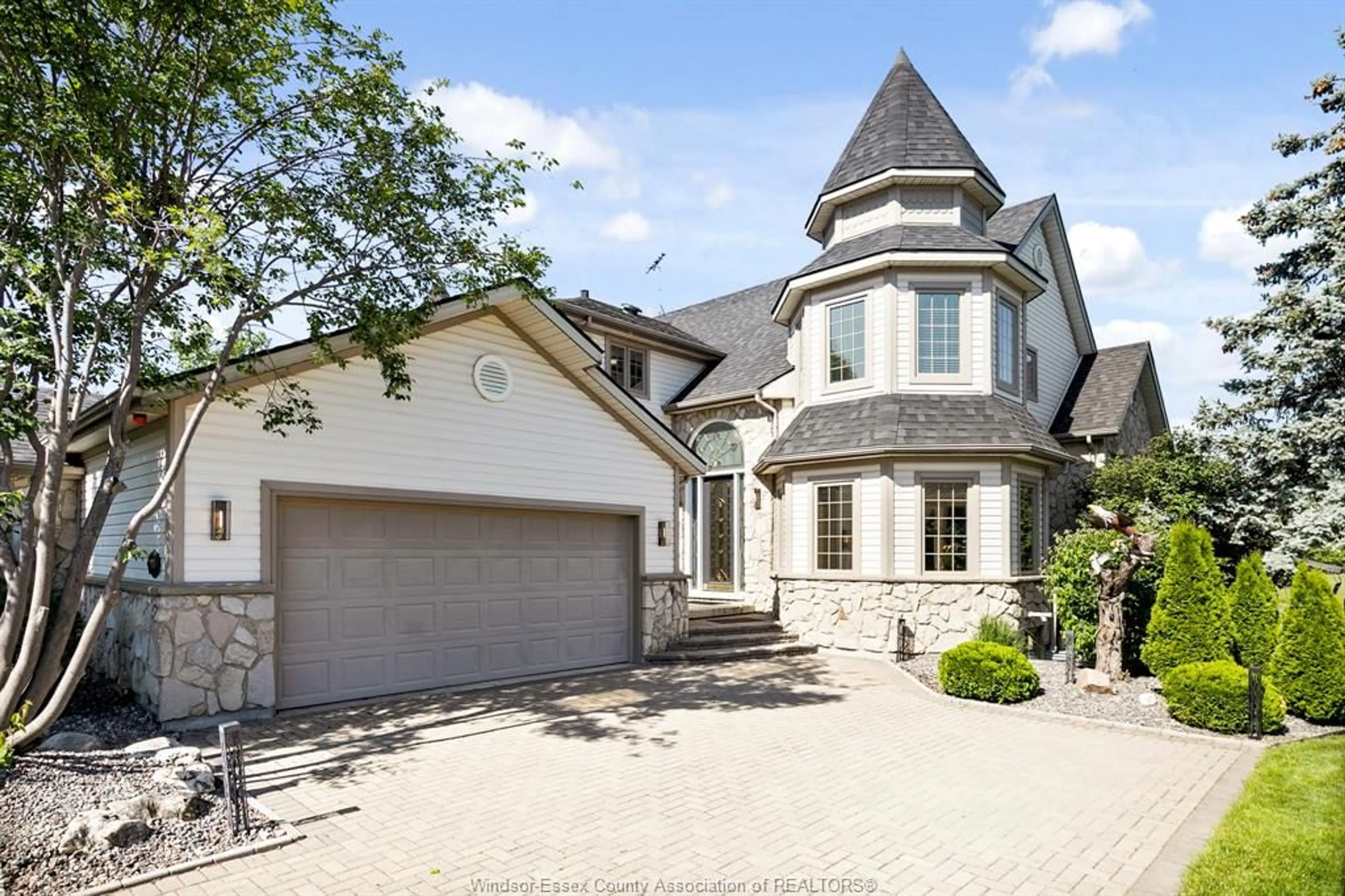 Home with brick exterior material, street for 504 Gold Coast Dr, Boblo Island Ontario N9V 4B2