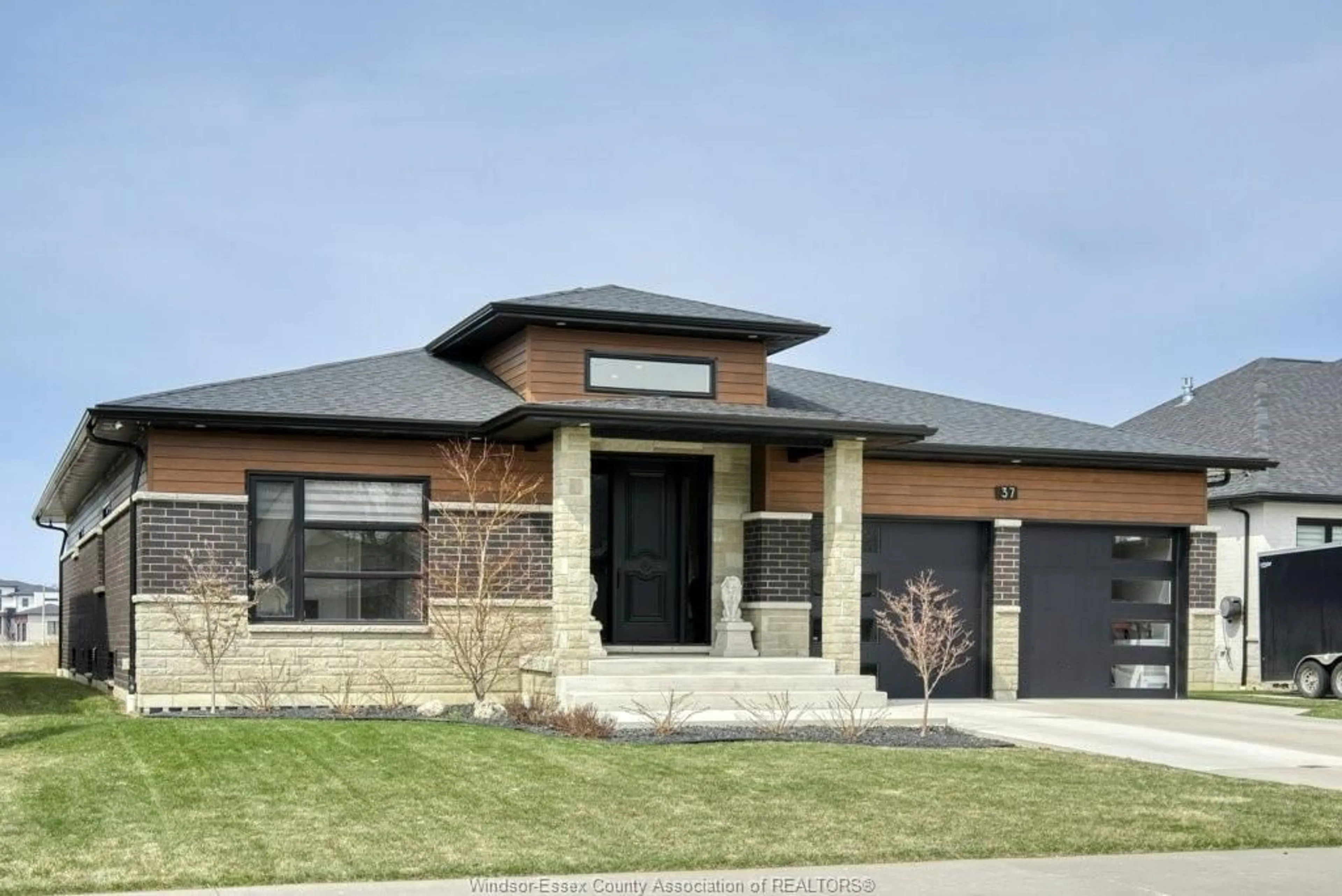 Home with brick exterior material, street for 37 AUGUSTA Dr, Leamington Ontario N8H 0C7