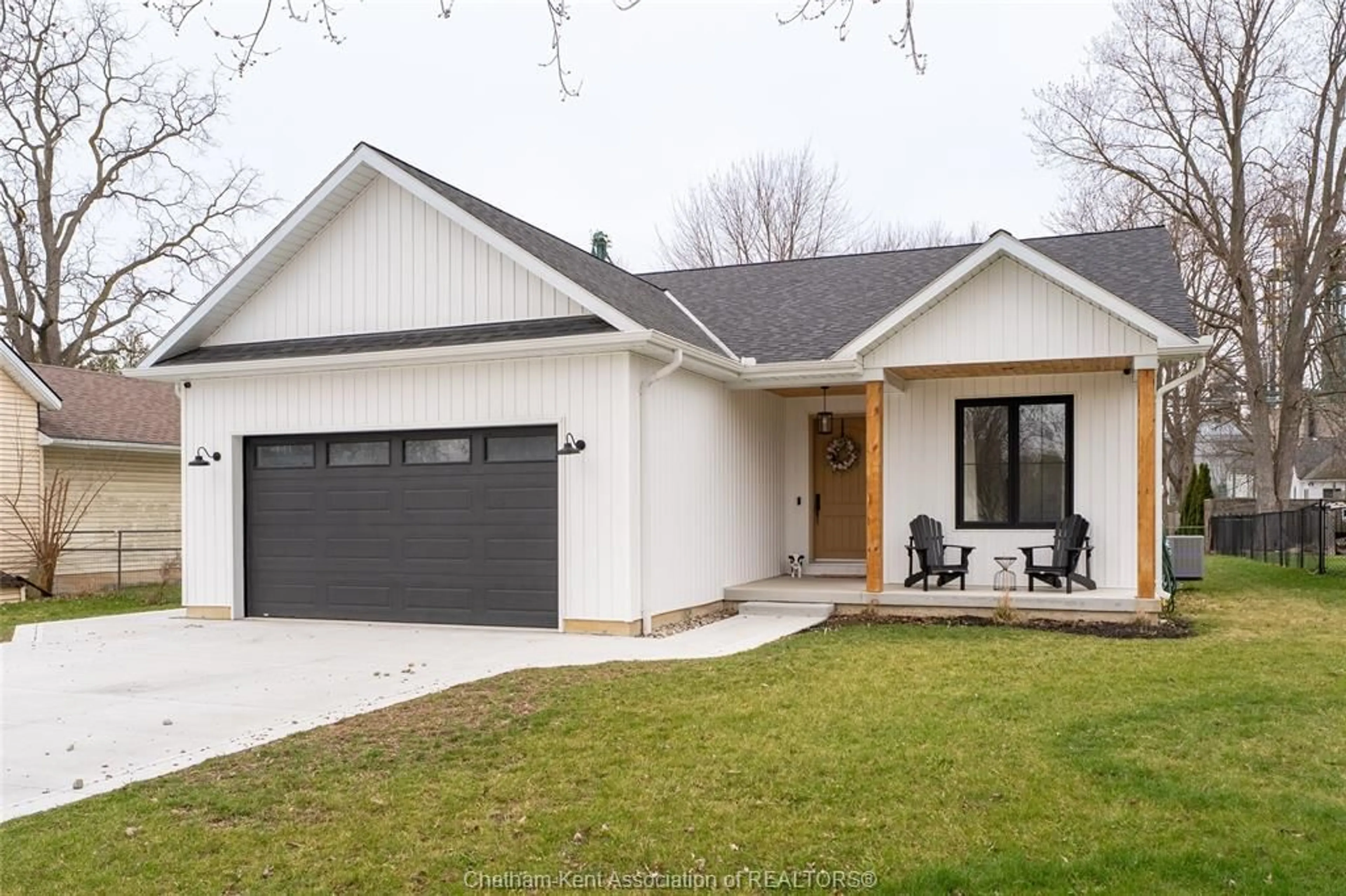 Home with vinyl exterior material, street for 11597 Longwoods Rd, Kent Bridge Ontario N0P 1V0