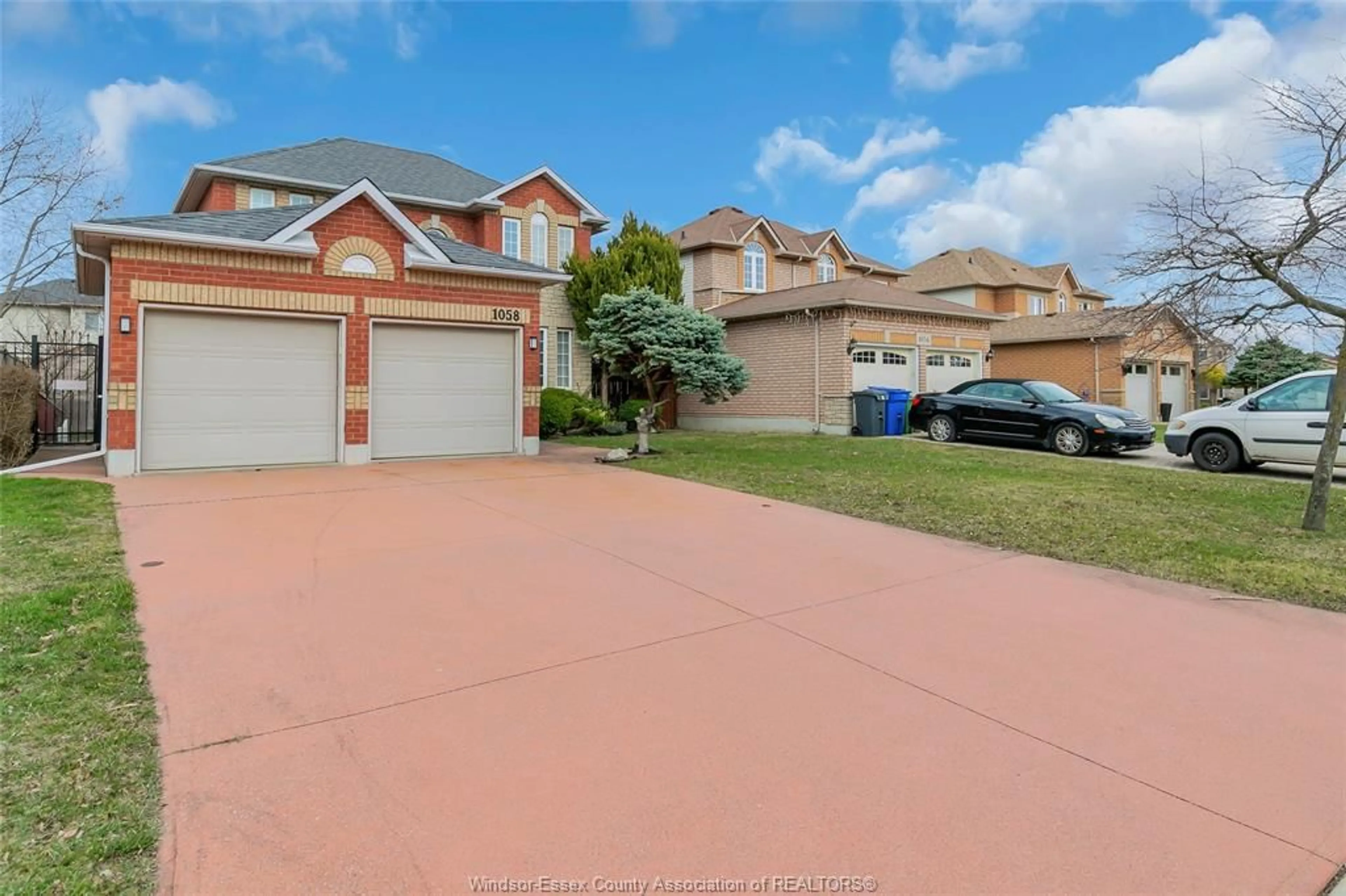 A pic from outside/outdoor area/front of a property/back of a property/a pic from drone, street for 1058 PEACH BLOSSOM Cres, Windsor Ontario N9G 2R5