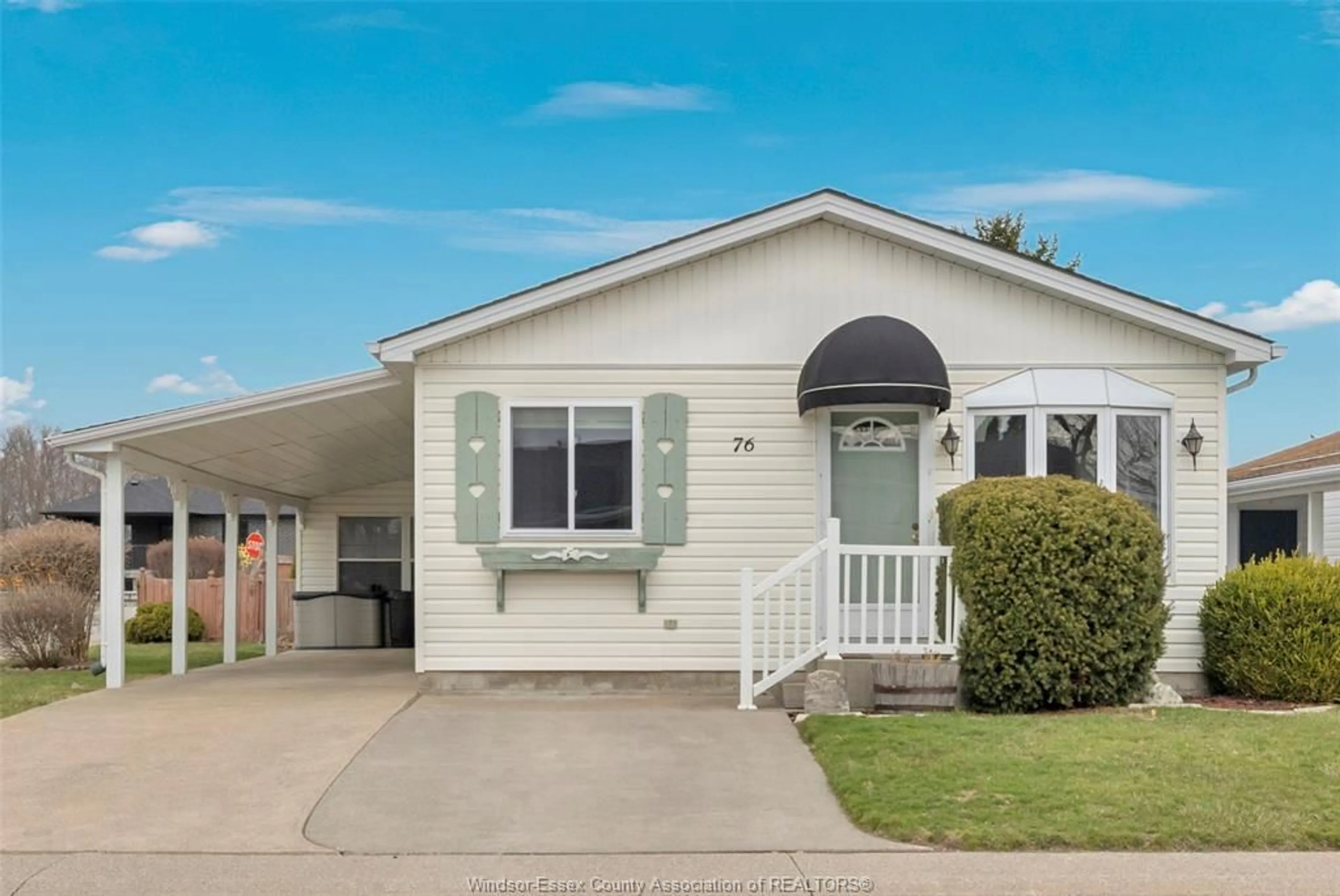 Home with vinyl exterior material, street for 76 CHERRY, McGregor Ontario N0R 1J0