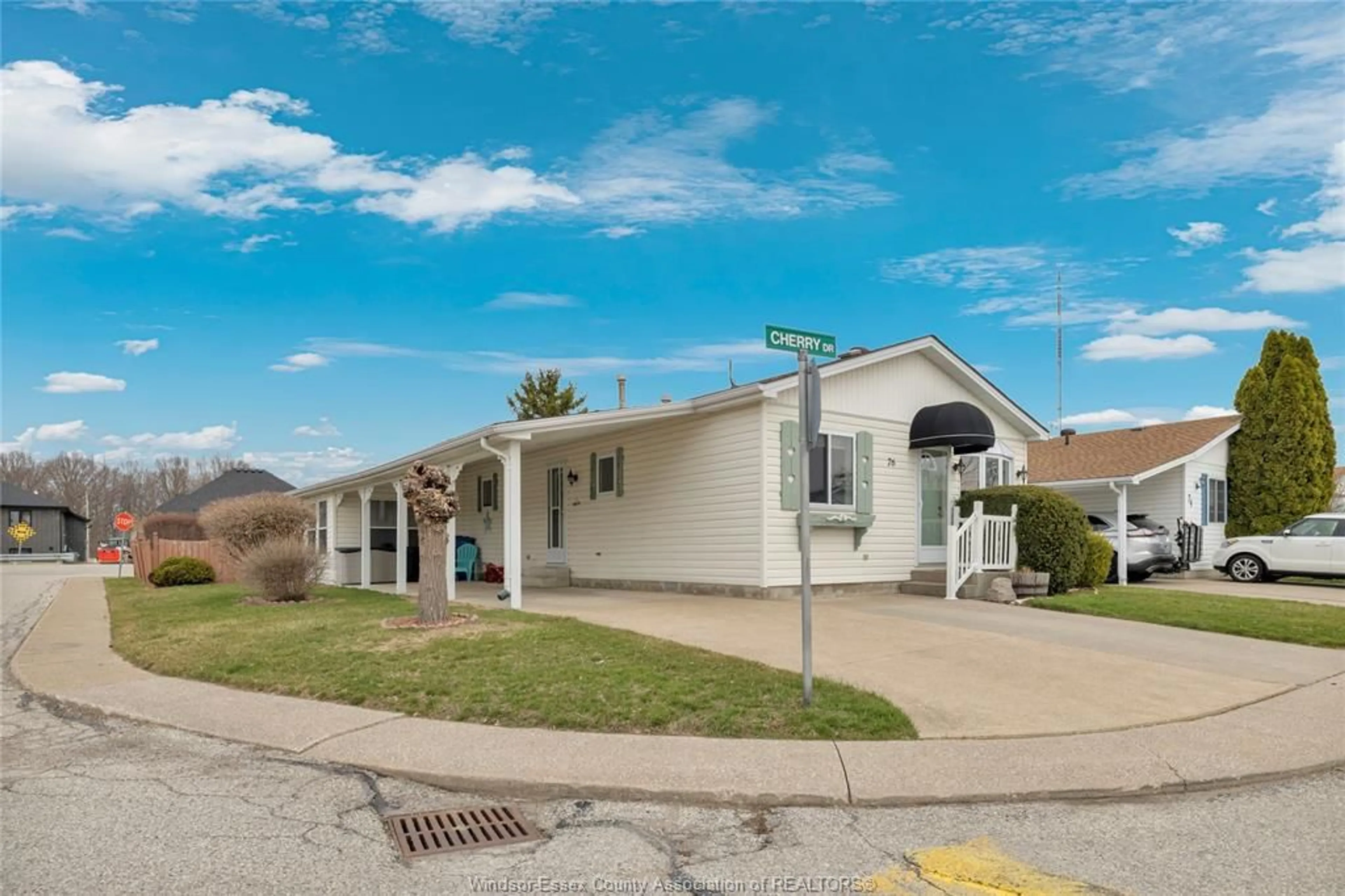 Home with vinyl exterior material, street for 76 CHERRY, McGregor Ontario N0R 1J0