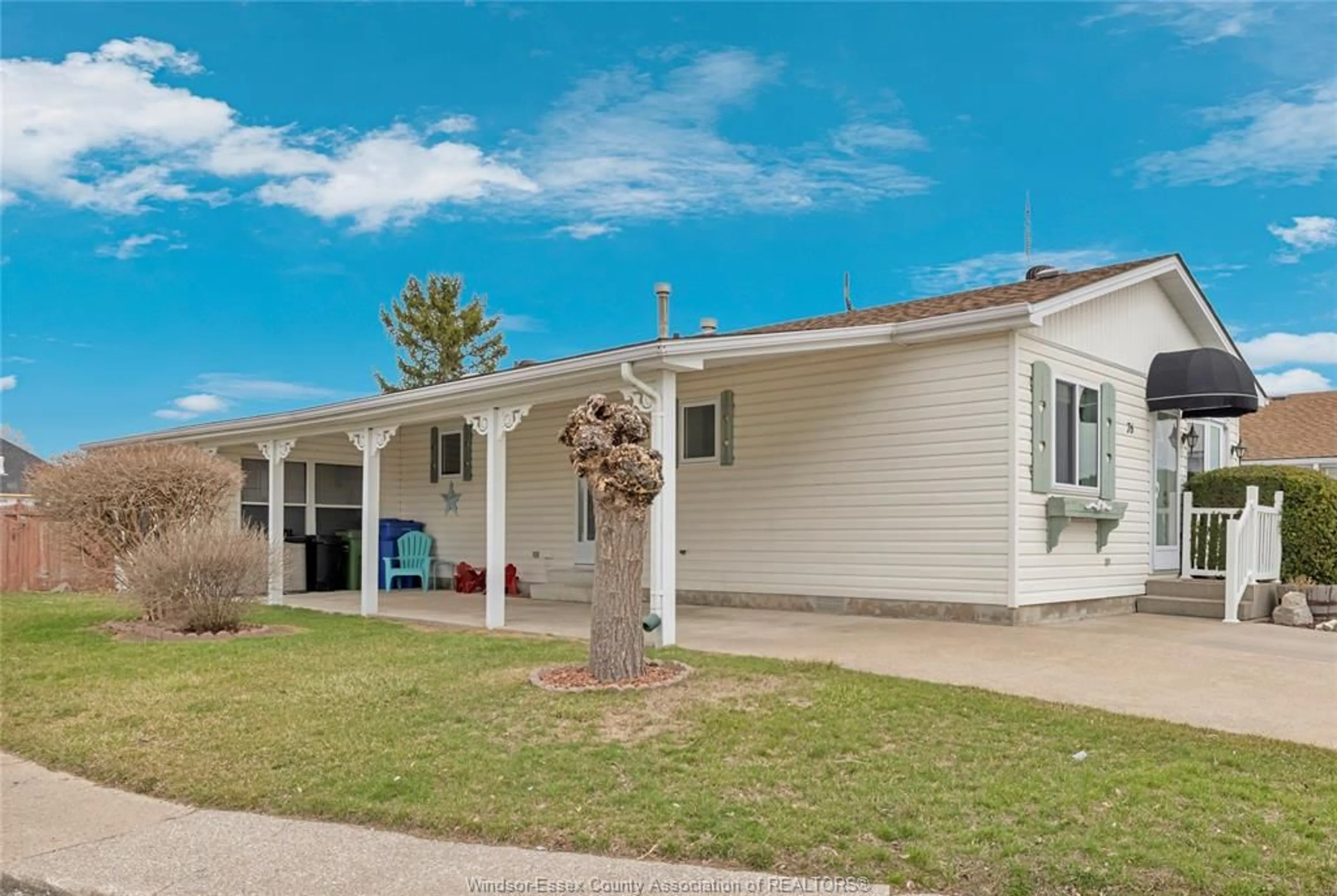 Home with vinyl exterior material, street for 76 CHERRY, McGregor Ontario N0R 1J0