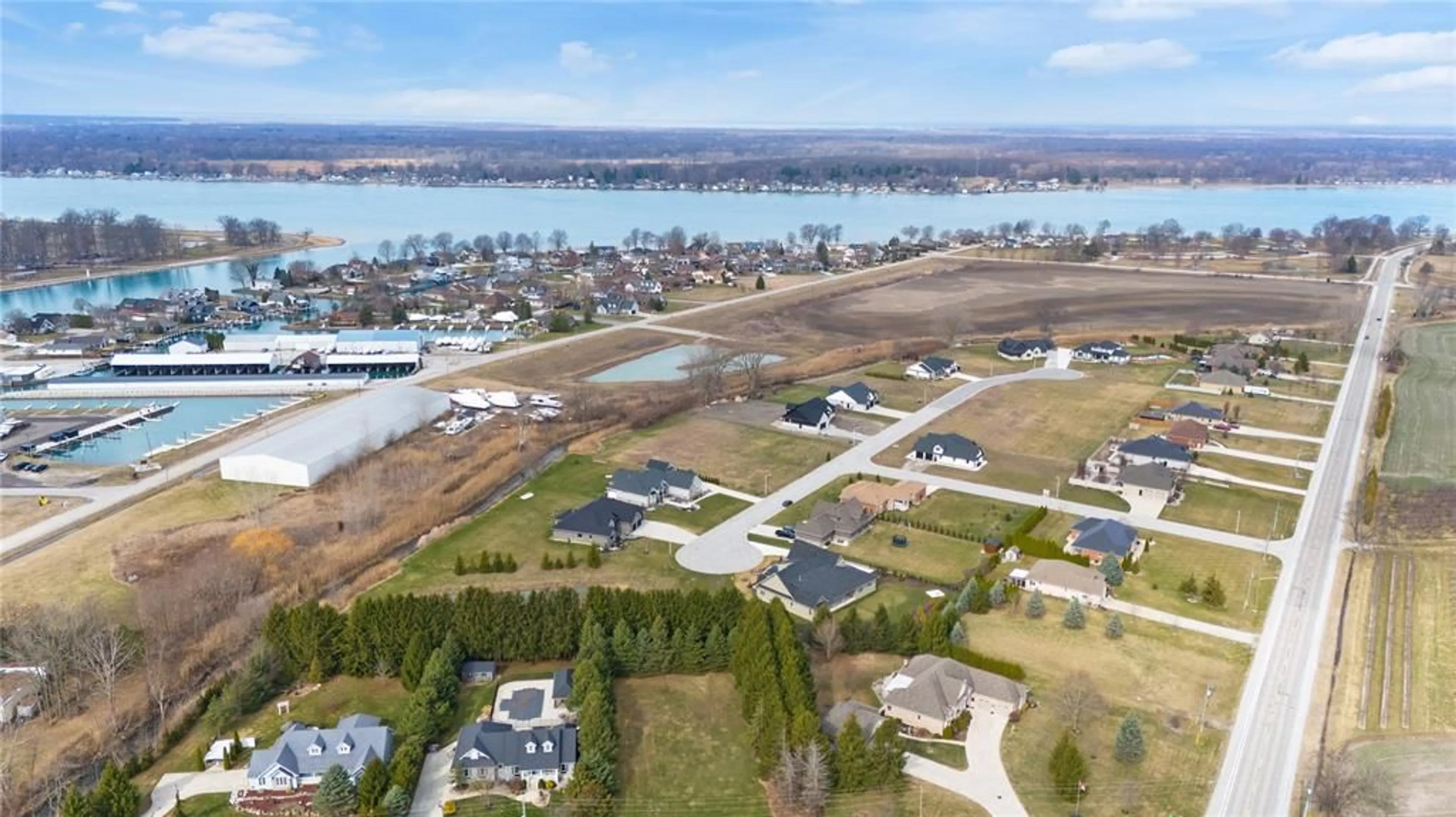 A pic from outside/outdoor area/front of a property/back of a property/a pic from drone, water/lake/river/ocean view for 22 TYLER Dr, Port Lambton Ontario N0P 1B0