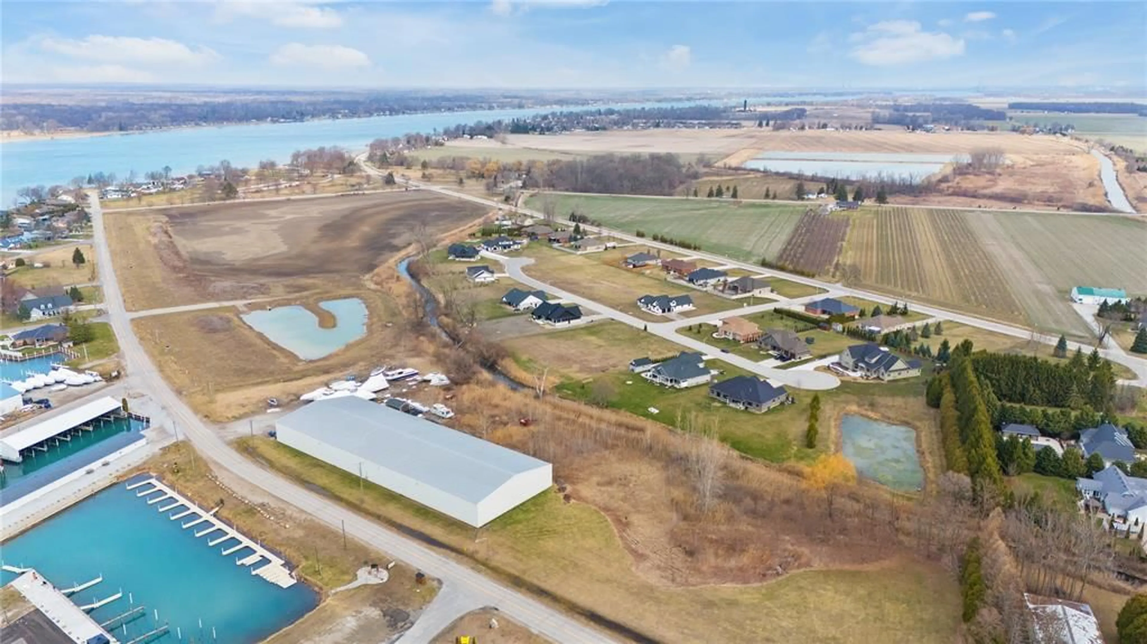 A pic from outside/outdoor area/front of a property/back of a property/a pic from drone, water/lake/river/ocean view for 22 TYLER Dr, Port Lambton Ontario N0P 1B0