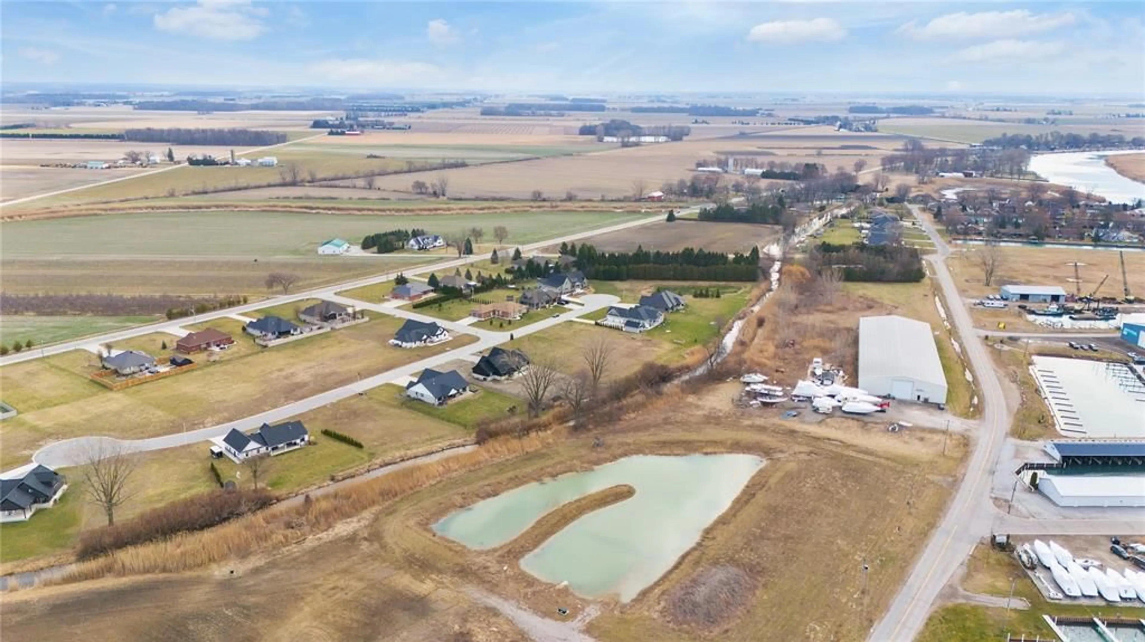 A pic from outside/outdoor area/front of a property/back of a property/a pic from drone, water/lake/river/ocean view for 22 TYLER Dr, Port Lambton Ontario N0P 1B0