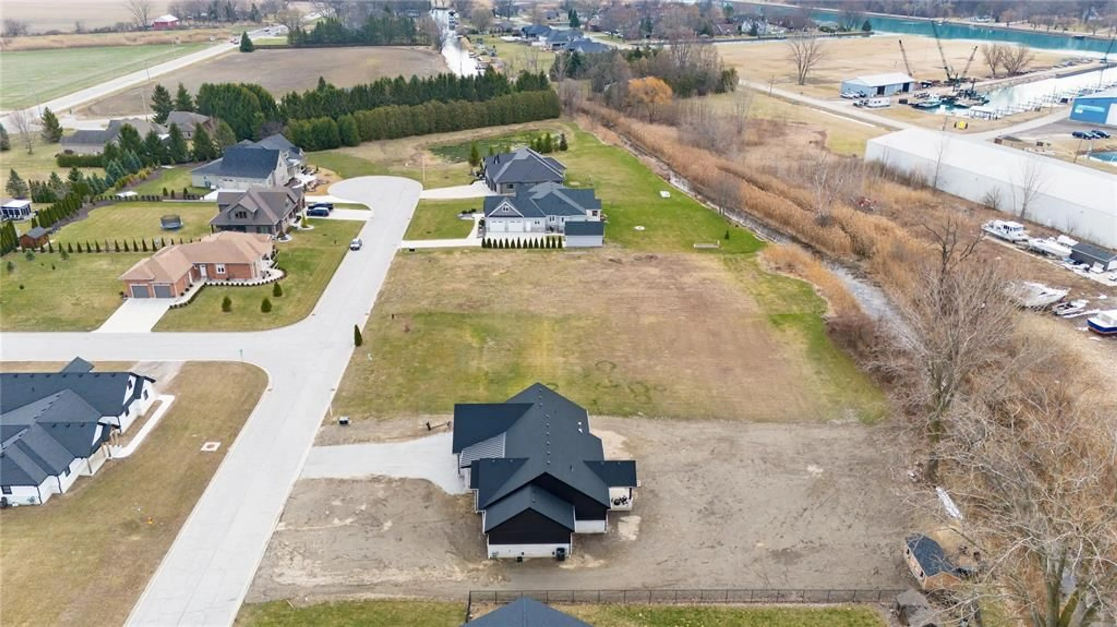 A pic from outside/outdoor area/front of a property/back of a property/a pic from drone, unknown for 22 TYLER Dr, Port Lambton Ontario N0P 1B0