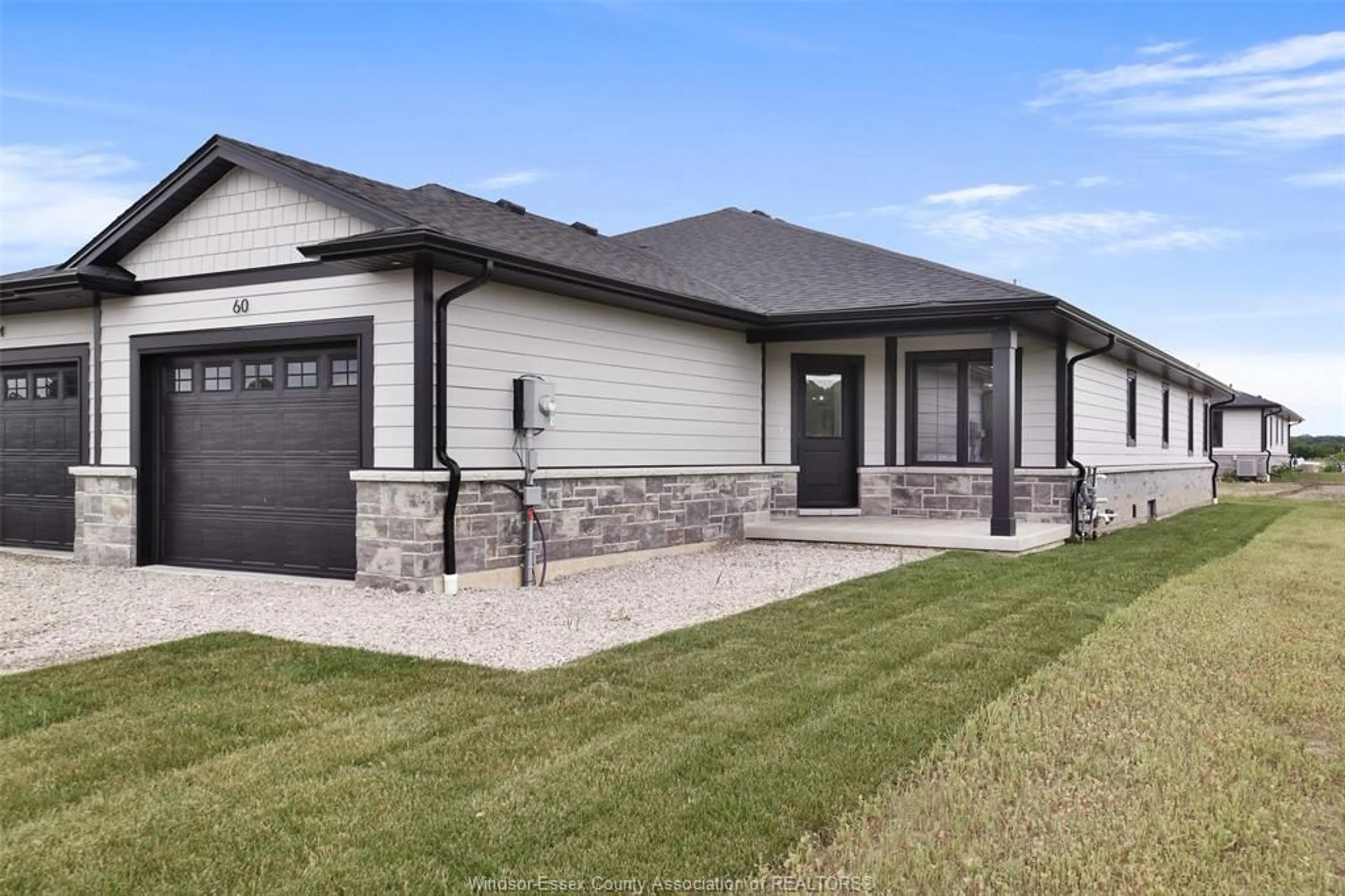 Home with brick exterior material, street for 77 MCKENZIE St, Harrow Ontario N0R 1G0