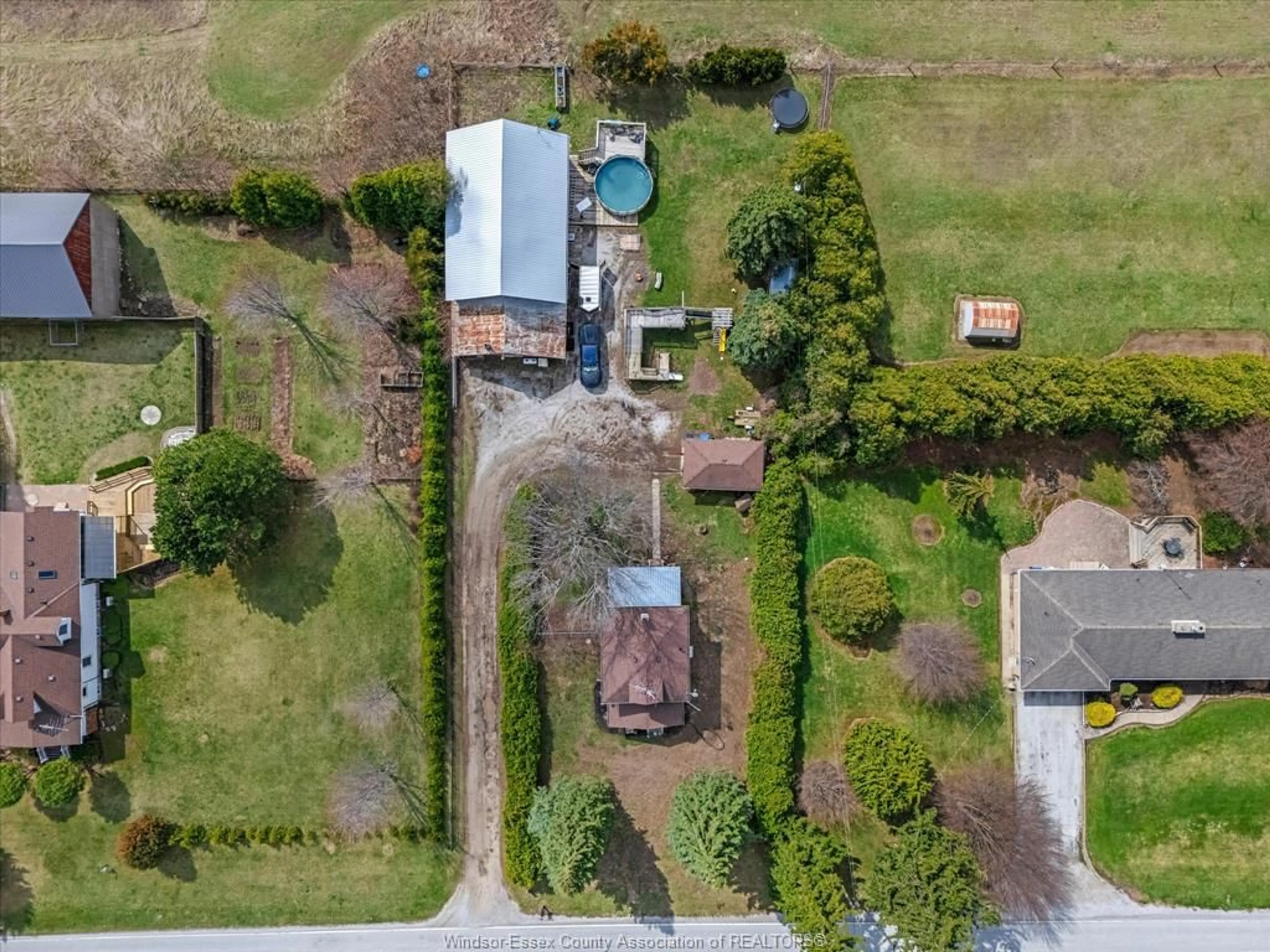 A pic from outside/outdoor area/front of a property/back of a property/a pic from drone, street for 1991 Road 5, Ruthven Ontario N0P 2G0