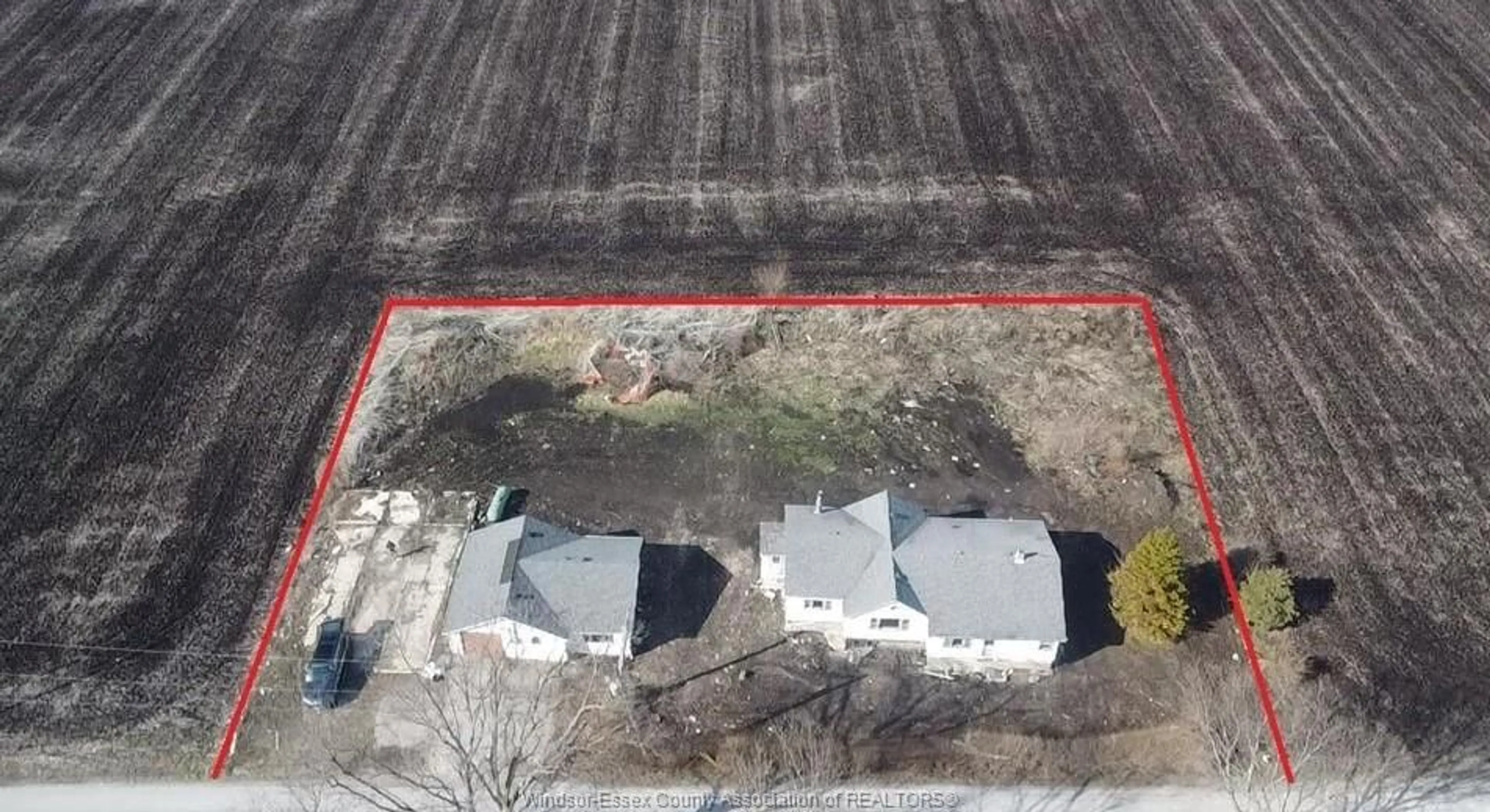 A pic from outside/outdoor area/front of a property/back of a property/a pic from drone, building for 1833 Mersea Rd, Leamington Ontario N8H 3V4