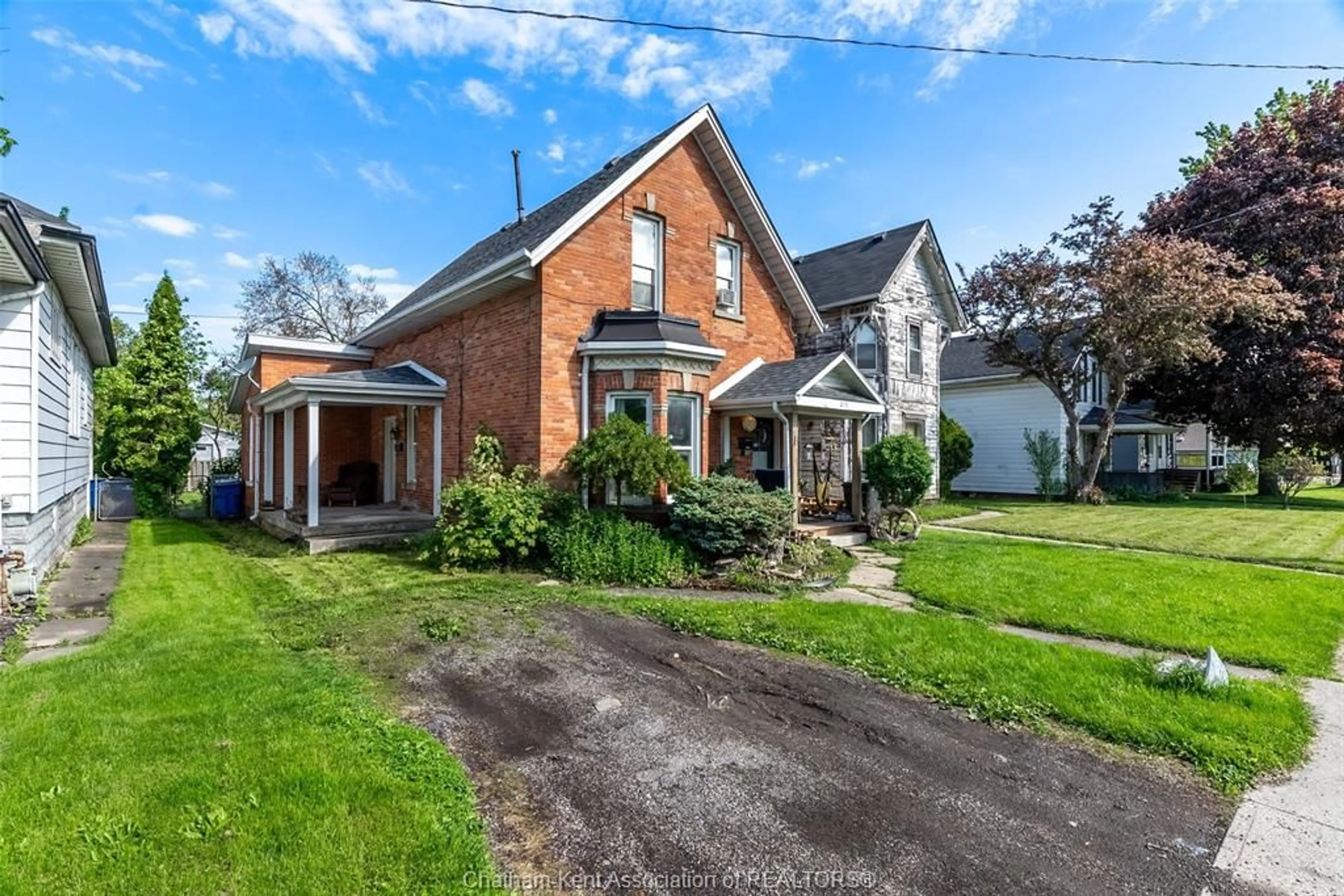 A pic from outside/outdoor area/front of a property/back of a property/a pic from drone, street for 215 Grand Ave, Chatham Ontario N7L 1W3