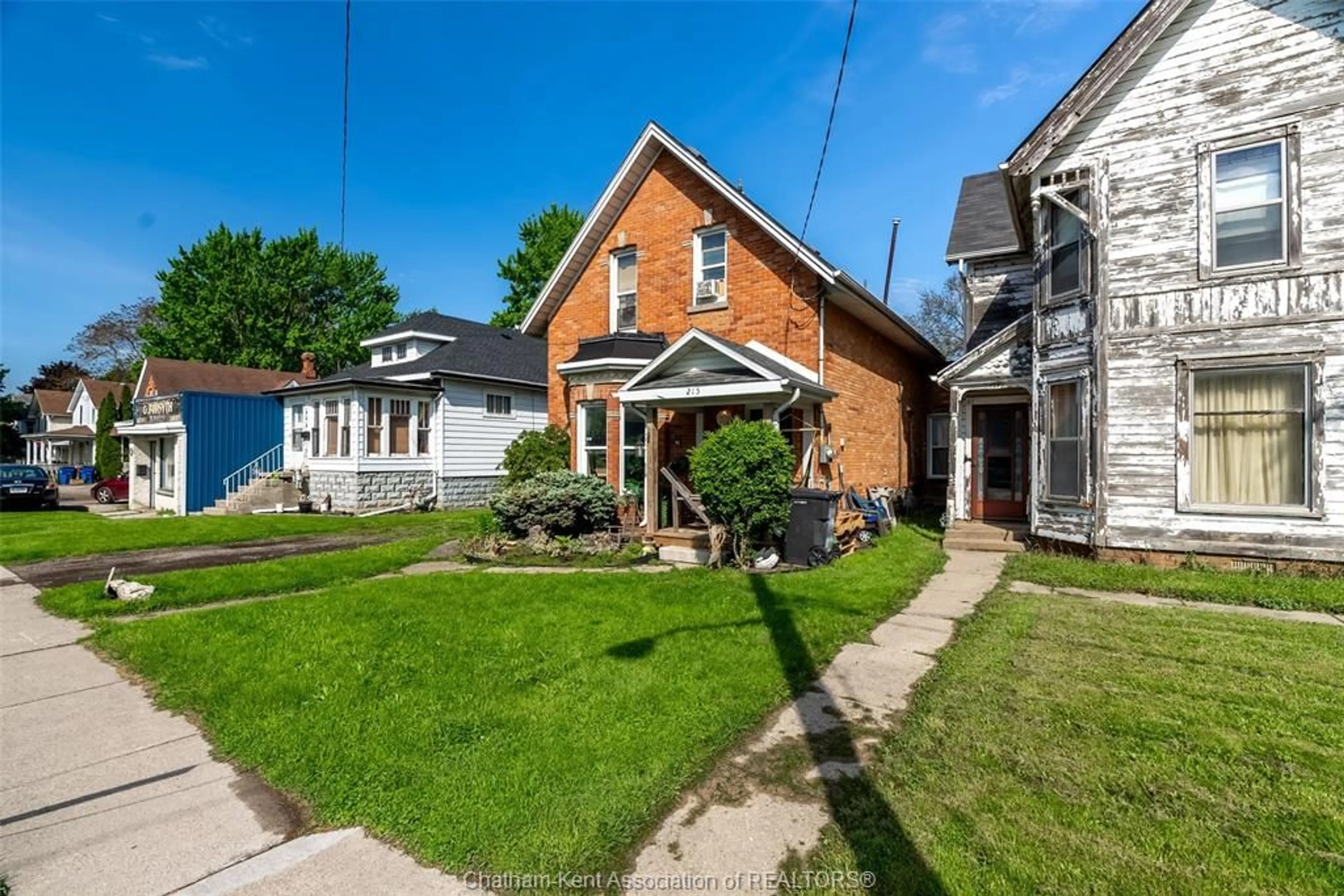 A pic from outside/outdoor area/front of a property/back of a property/a pic from drone, street for 215 Grand Ave, Chatham Ontario N7L 1W3
