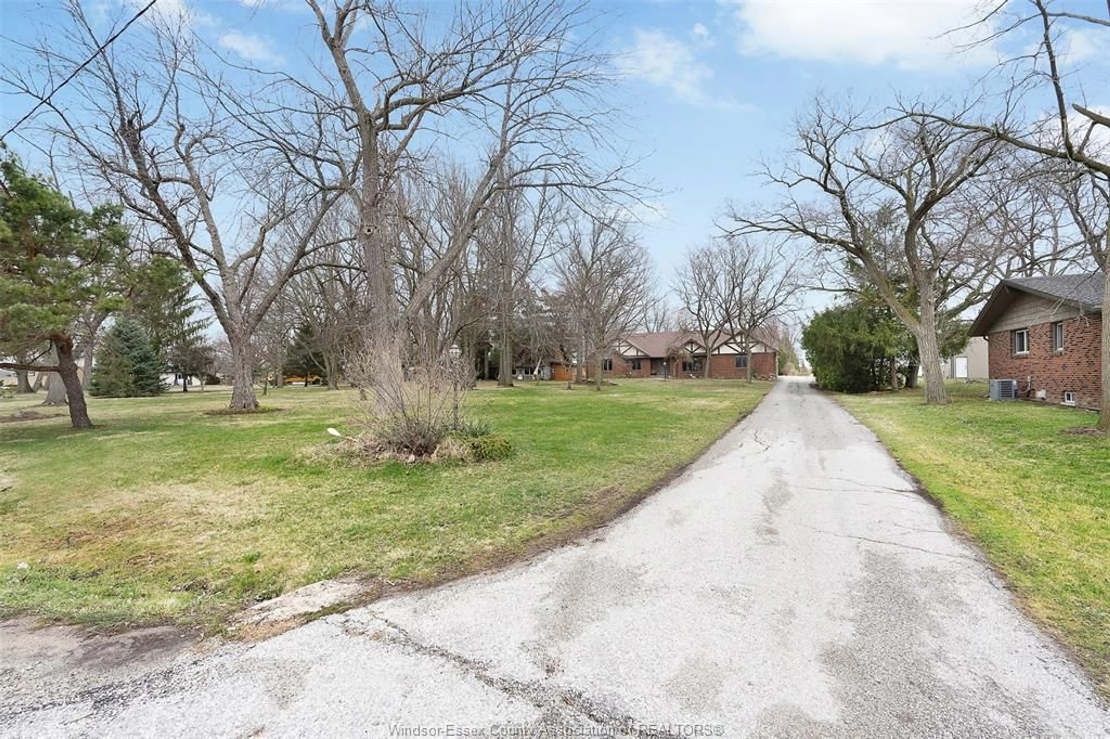 A pic from outside/outdoor area/front of a property/back of a property/a pic from drone, street for 308 EAST RUSCOM RIVER Rd, St. Joachim Ontario N0R 1S0