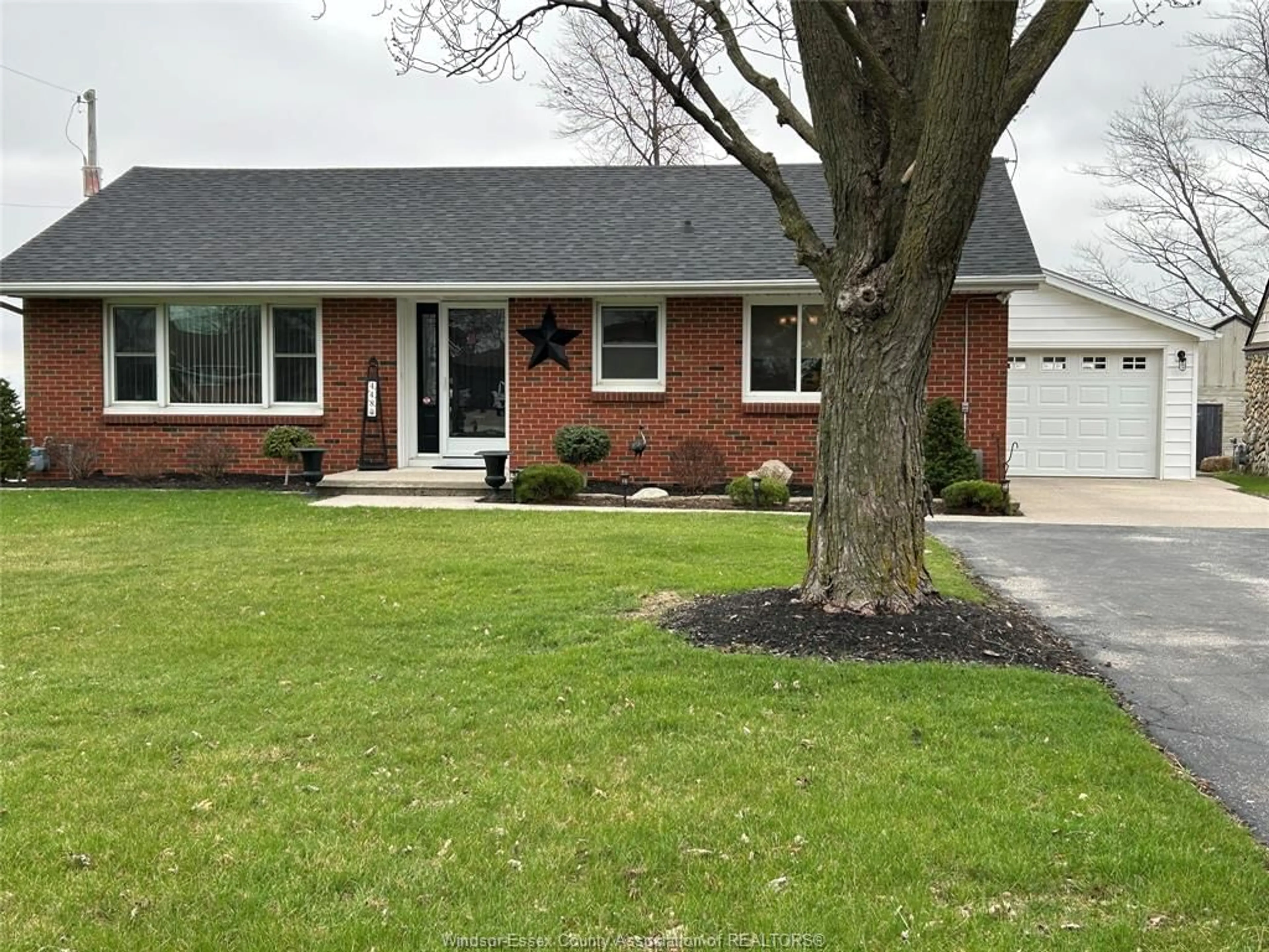 Home with brick exterior material, street for 448 COUNTY RD 34, Kingsville Ontario N8M 2X5