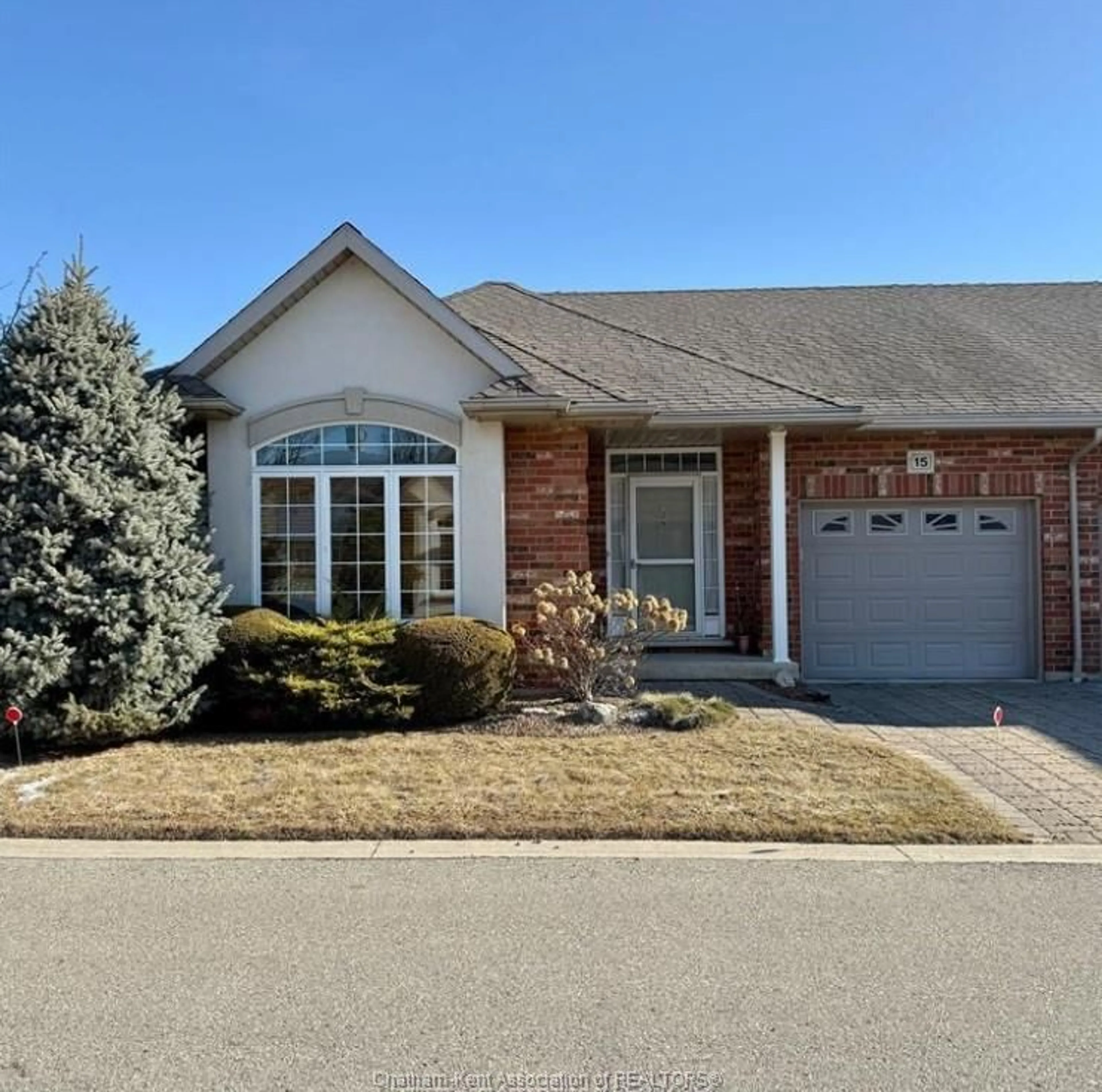 Home with brick exterior material, street for 15 Oakgrove Lane, Chatham Ontario N7L 5R9