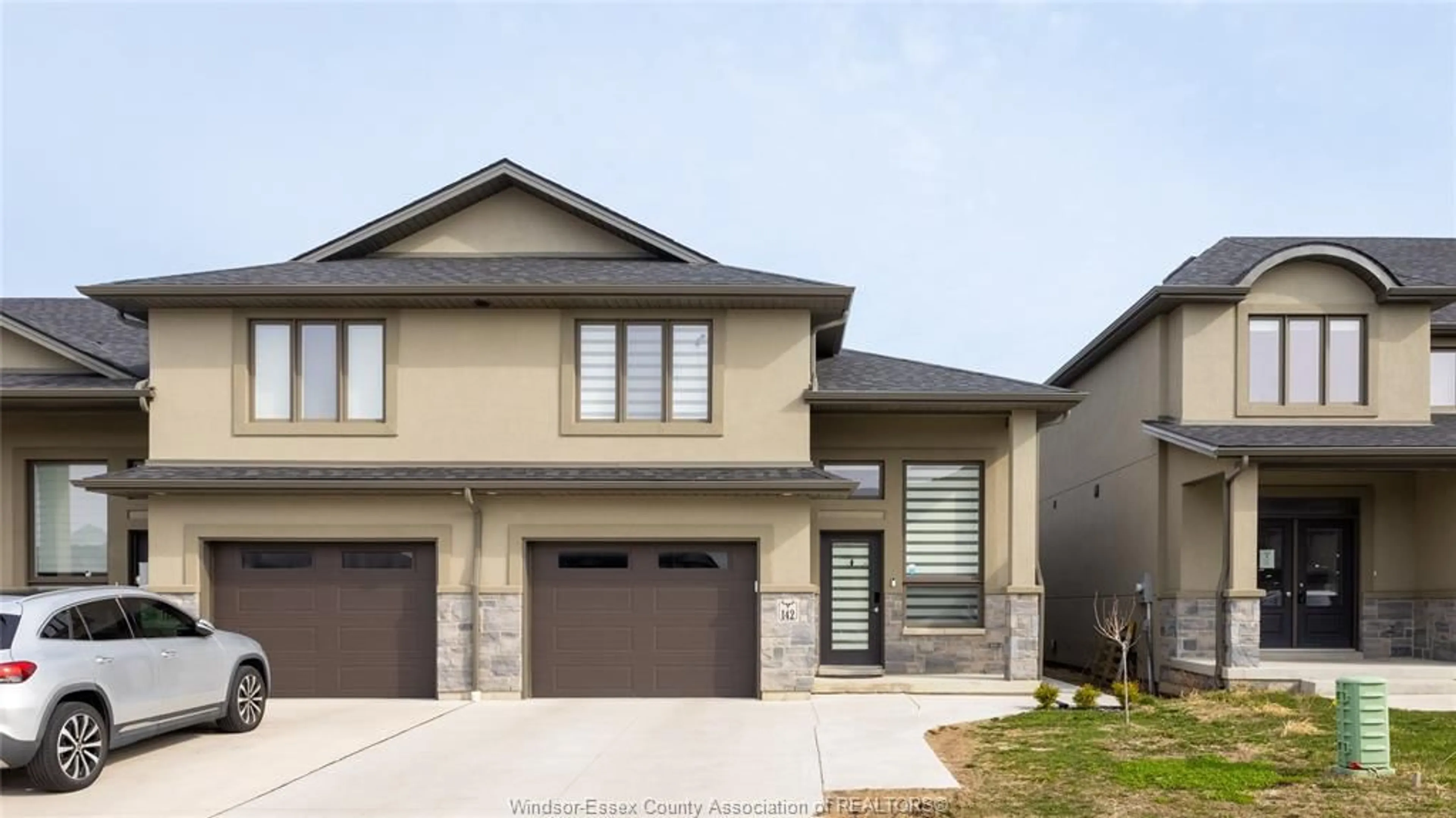 Home with brick exterior material, street for 142 LANE St, Essex Ontario N8M 0B1