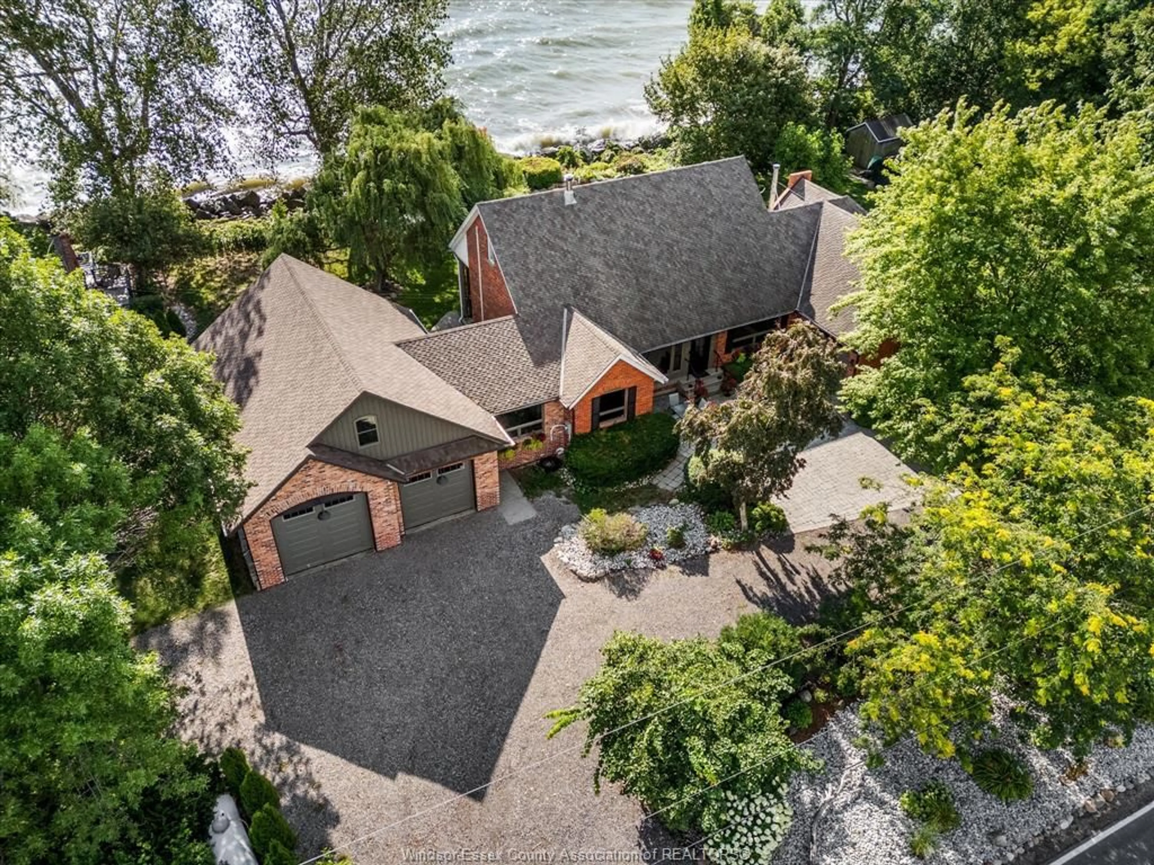 A pic from outside/outdoor area/front of a property/back of a property/a pic from drone, water/lake/river/ocean view for 266 EAST BEACH Rd, Leamington Ontario N8H 3V7