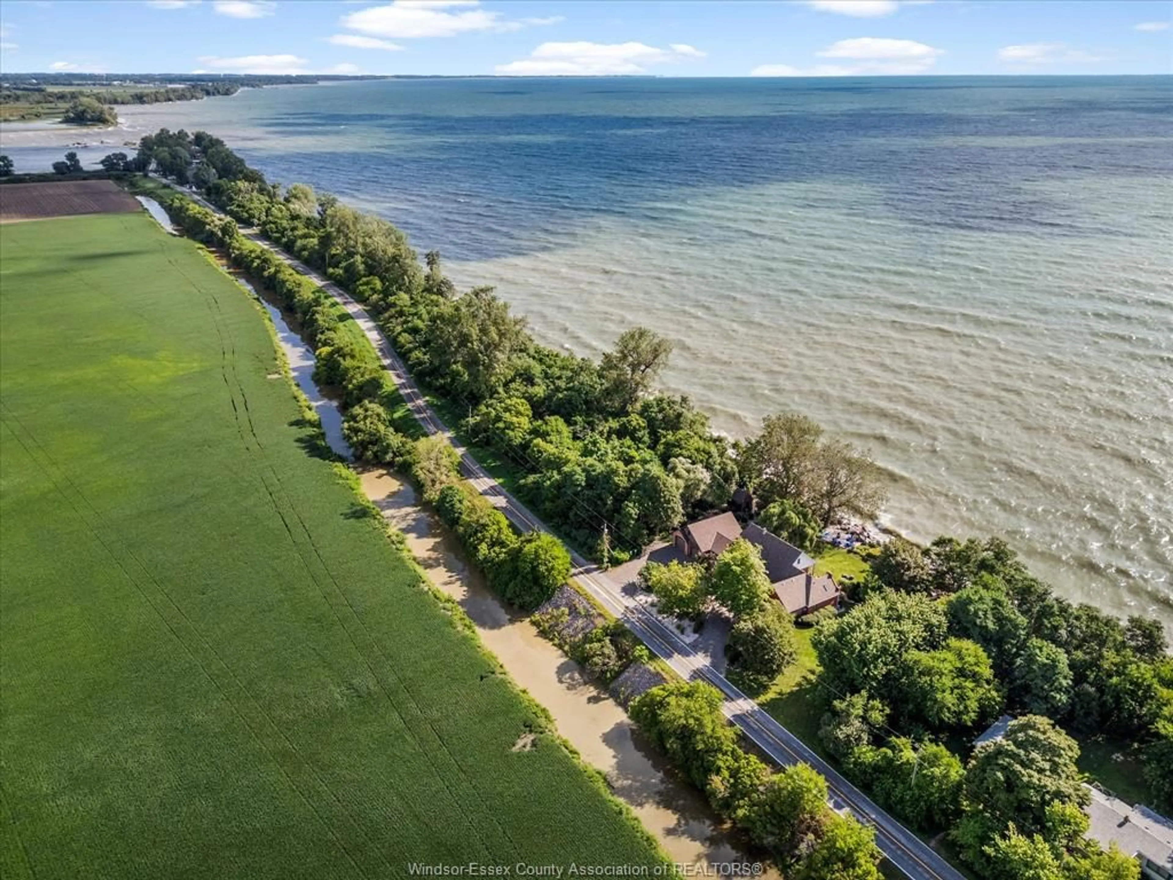 A pic from outside/outdoor area/front of a property/back of a property/a pic from drone, water/lake/river/ocean view for 266 EAST BEACH Rd, Leamington Ontario N8H 3V7