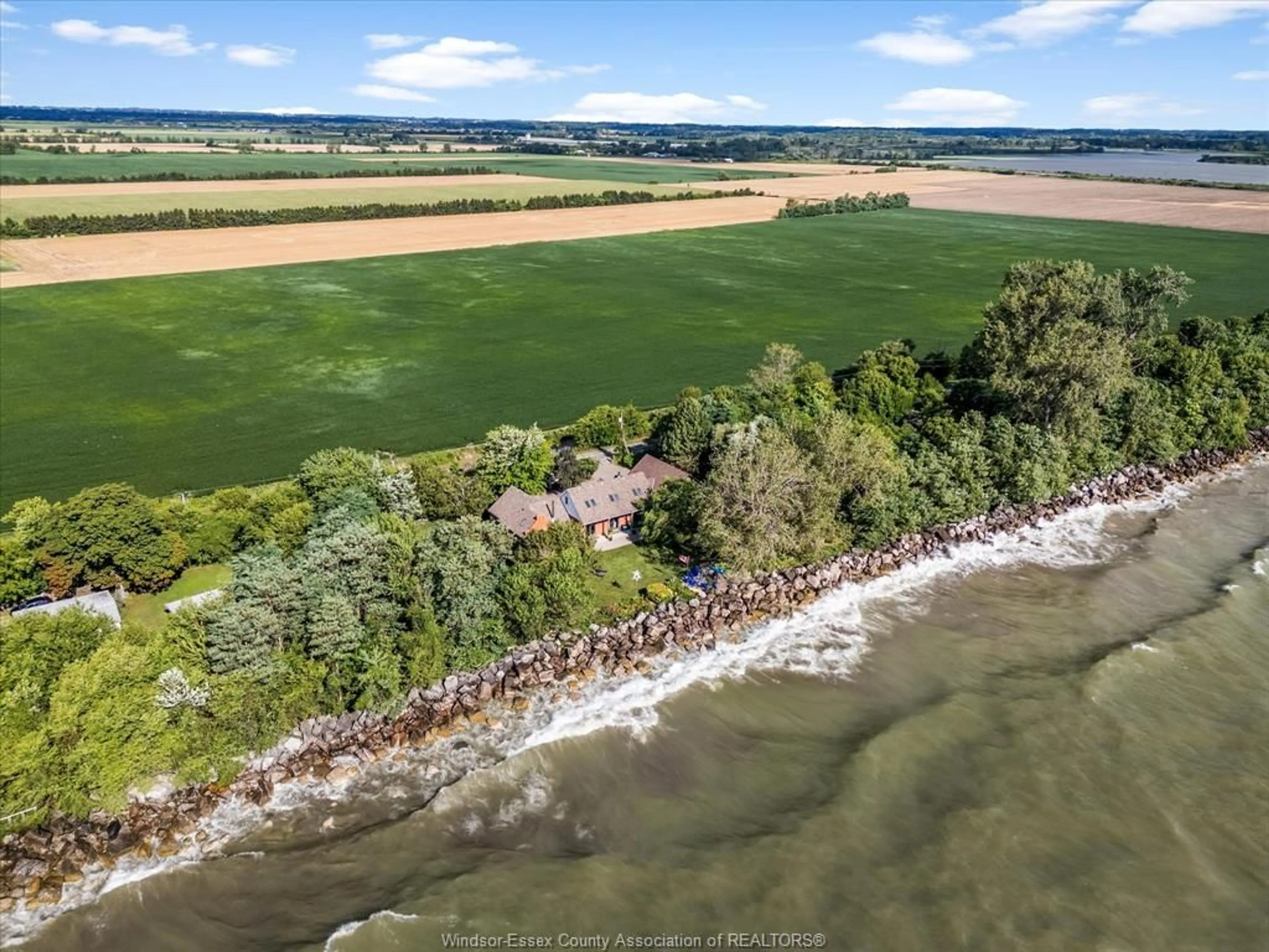 A pic from outside/outdoor area/front of a property/back of a property/a pic from drone, water/lake/river/ocean view for 266 EAST BEACH Rd, Leamington Ontario N8H 3V7