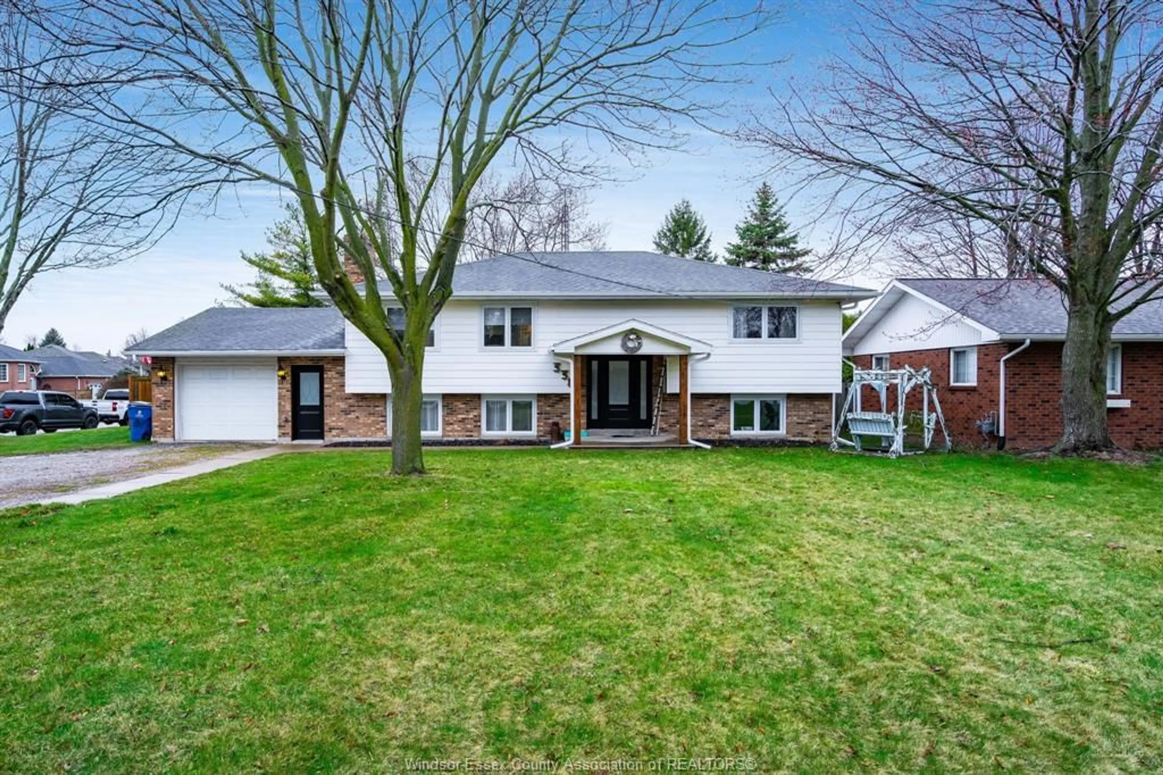 Home with vinyl exterior material, street for 338 Erie St, Wheatley Ontario N0P 2P0