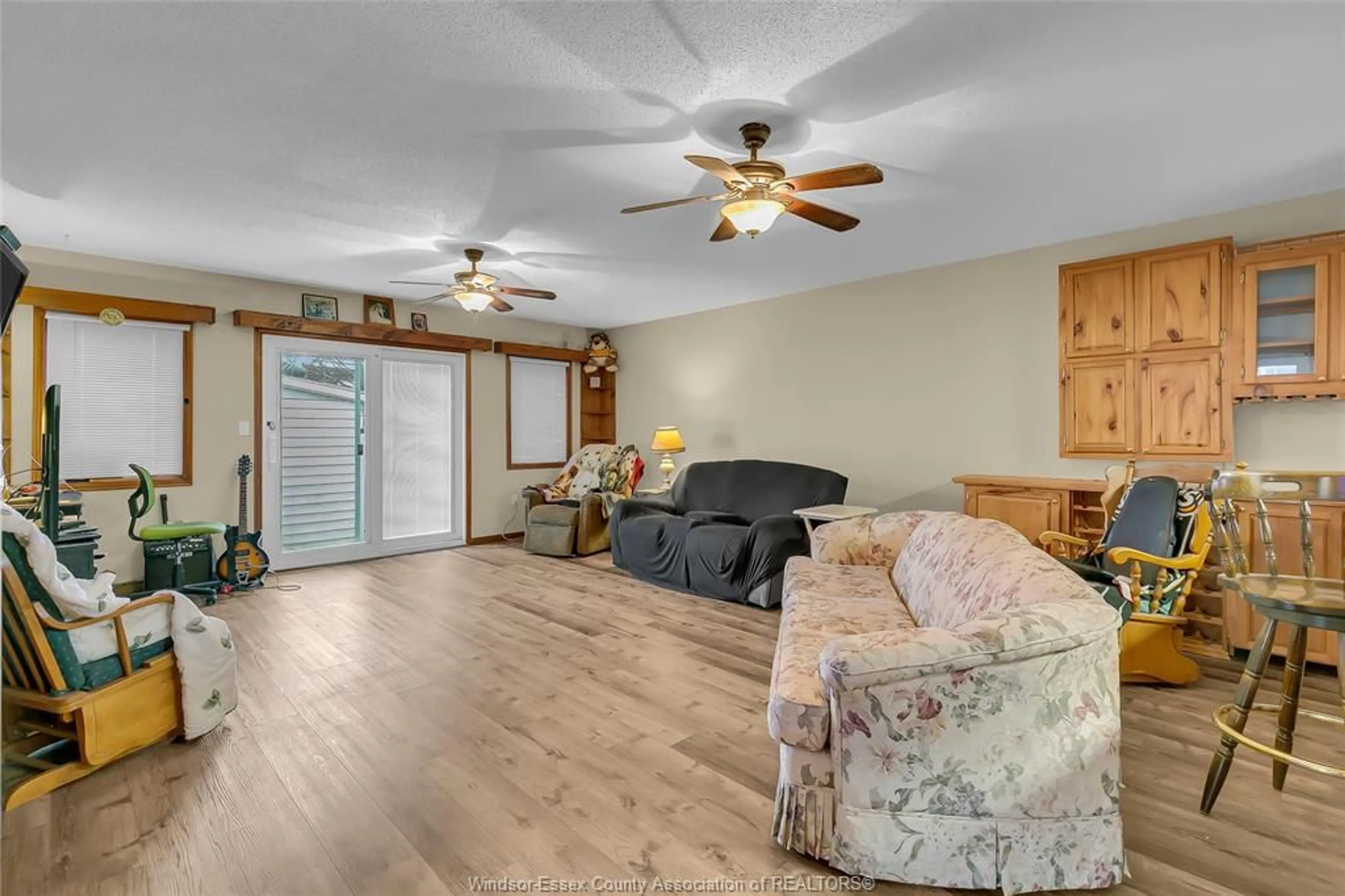 Living room with furniture, wood/laminate floor for 1891 JEFFERSON, Windsor Ontario N8T 2V9