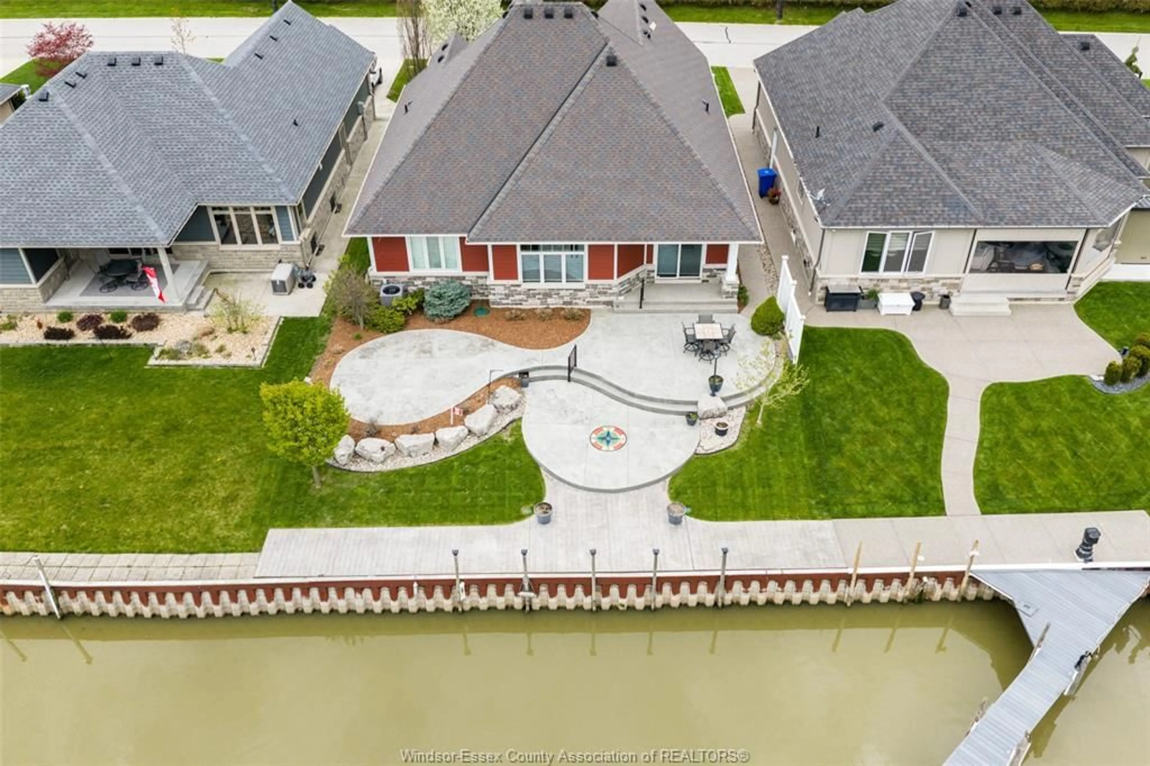 A pic from outside/outdoor area/front of a property/back of a property/a pic from drone, water/lake/river/ocean view for 33 MONTEGO BAY Cres, Kingsville Ontario N9Y 4E7
