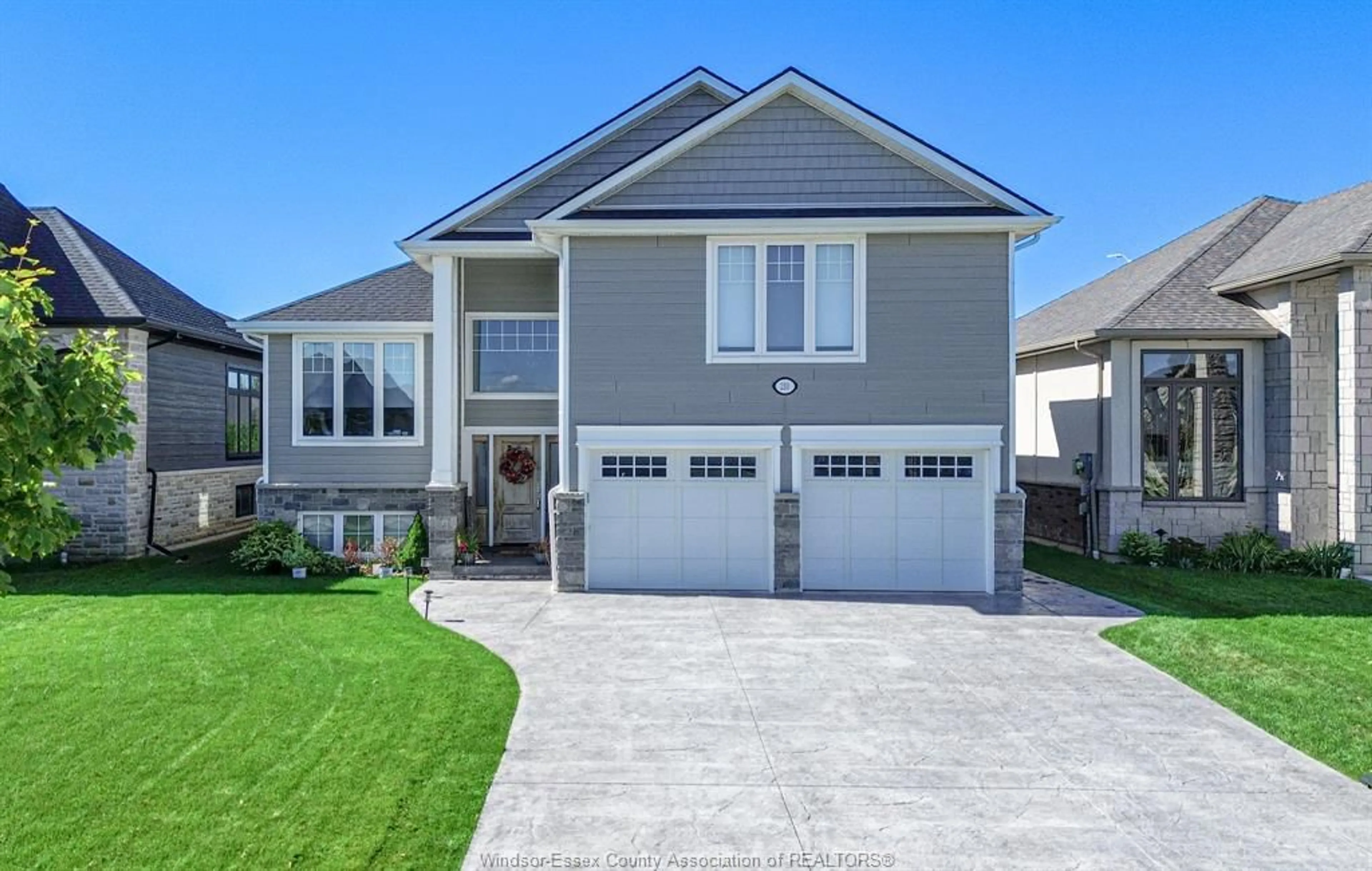 Home with vinyl exterior material, street for 210 SUMMER, Belle River Ontario N0R 1A0