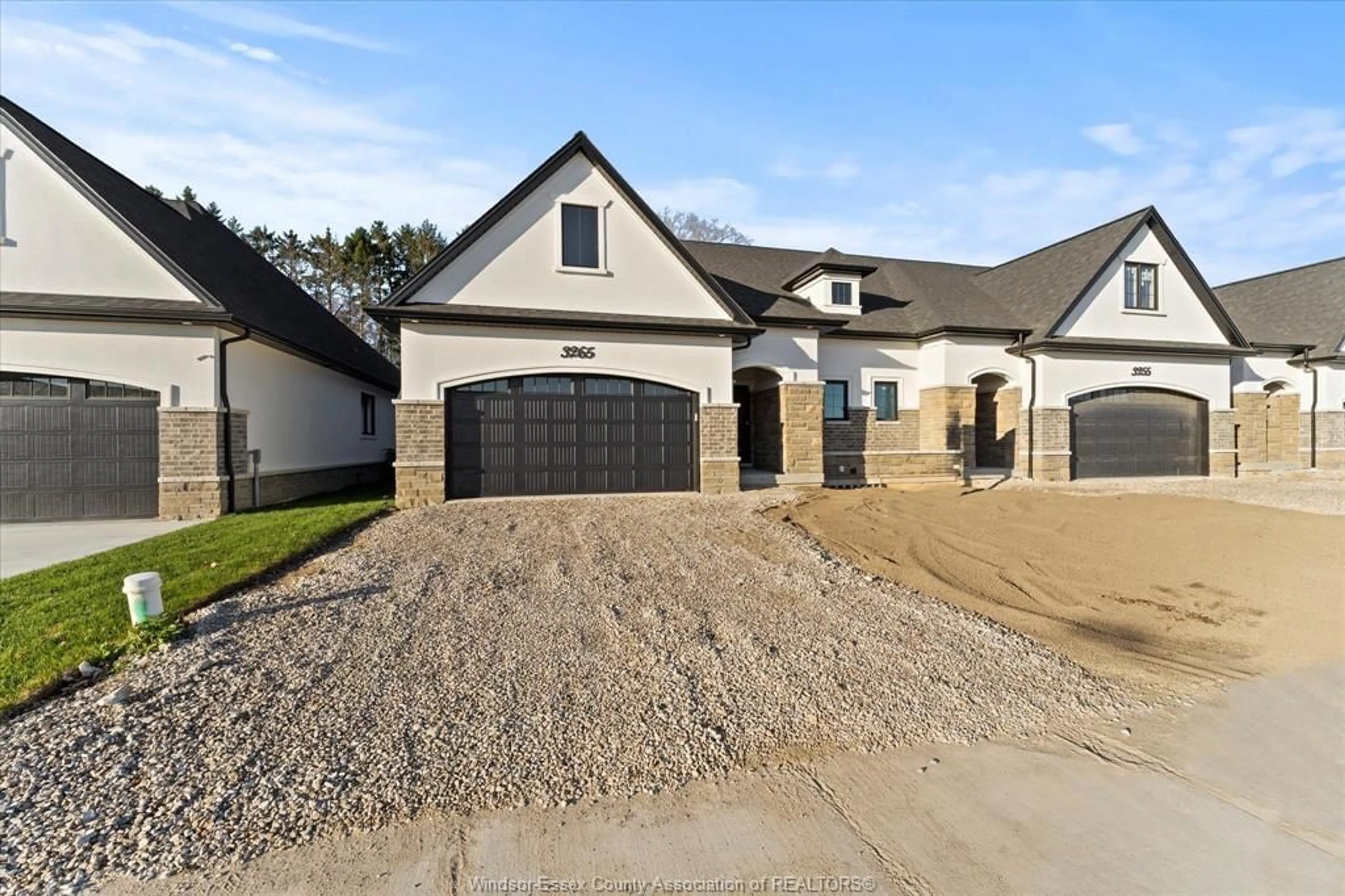 Home with brick exterior material, street for 3265 TULLIO Dr, LaSalle Ontario N9H 1H3