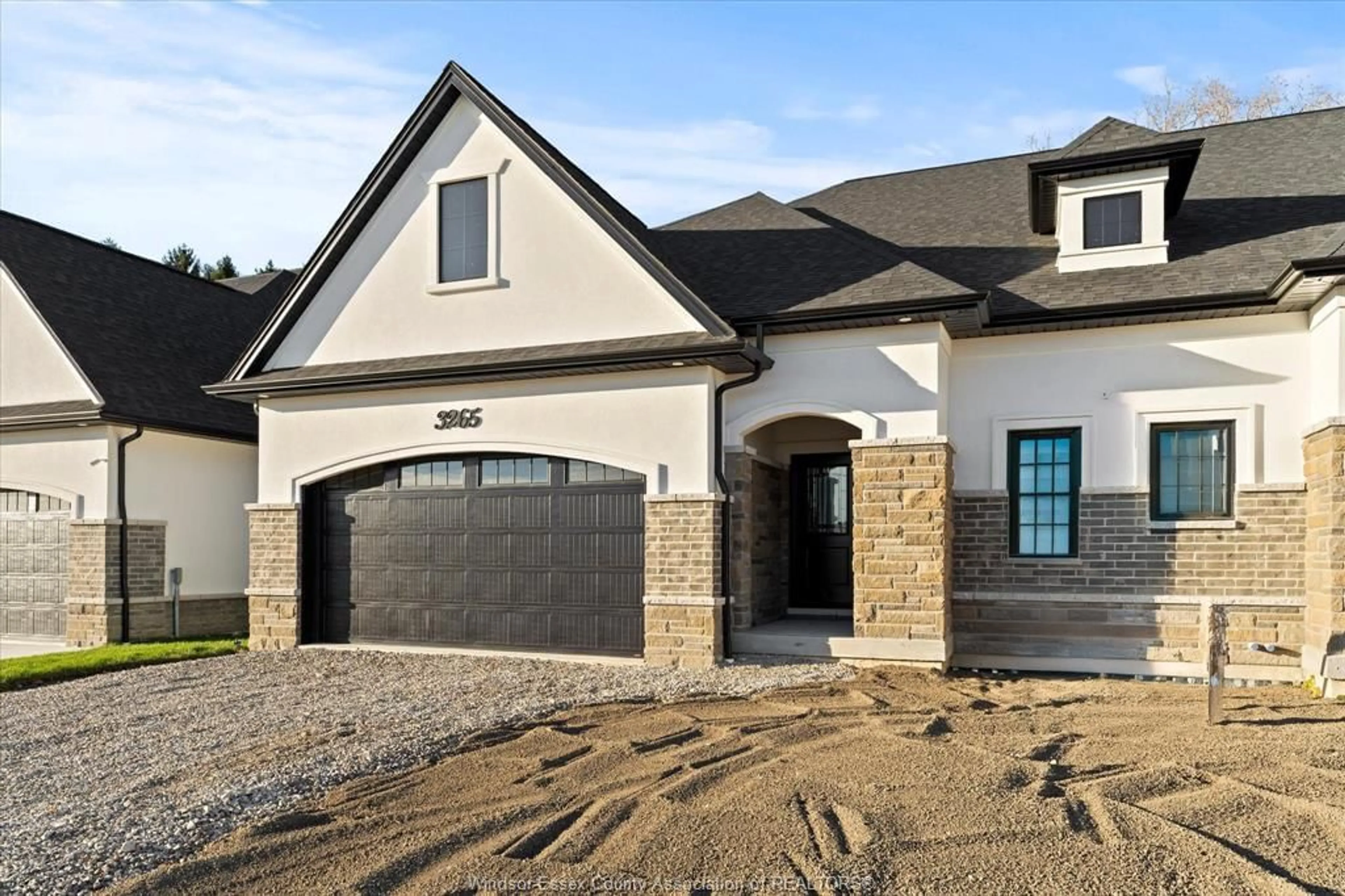 Home with brick exterior material, street for 3265 TULLIO Dr, LaSalle Ontario N9H 1H3