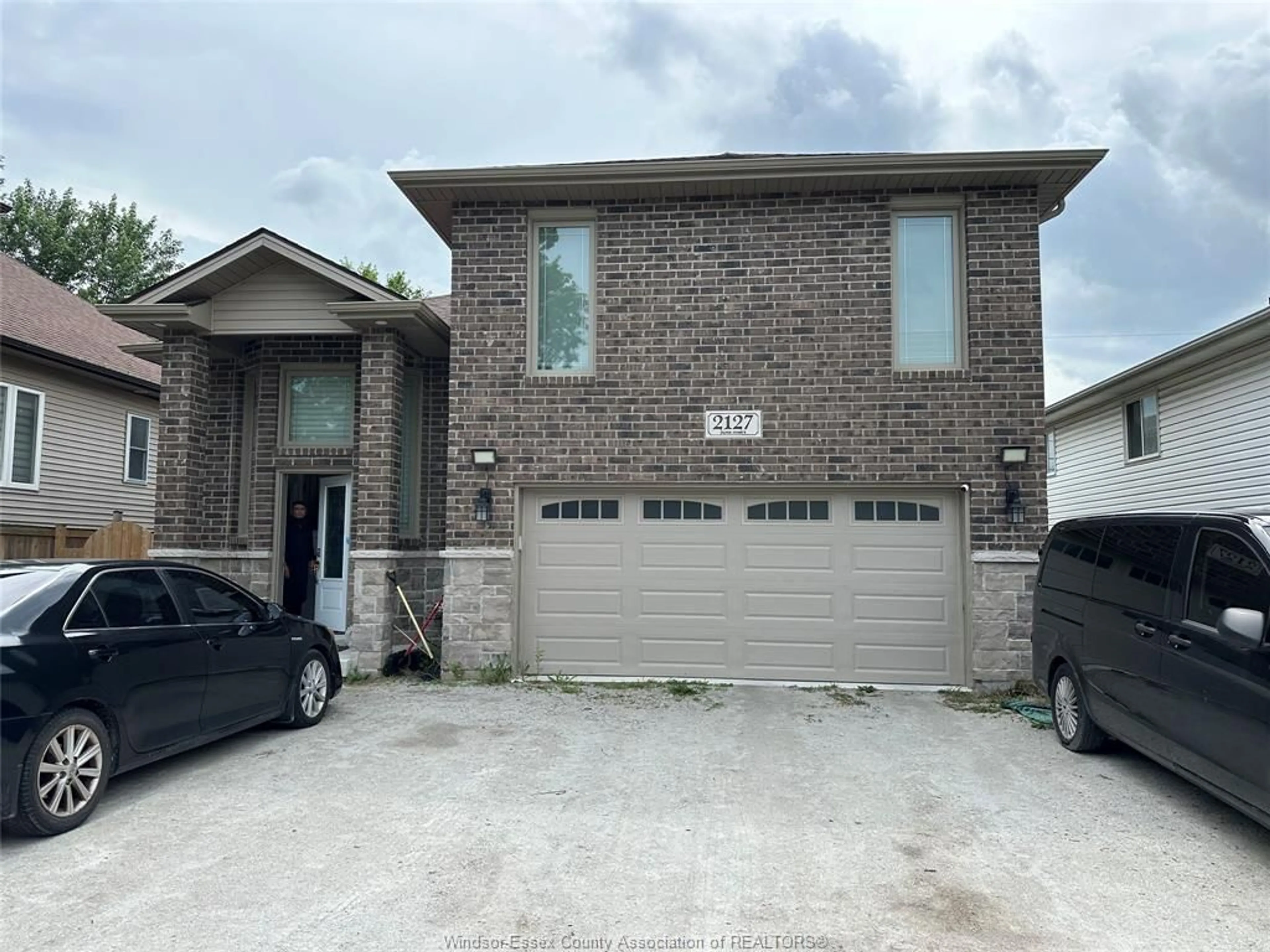 Home with brick exterior material, street for 2127 DOMINION Blvd, Windsor Ontario N9B 3H8