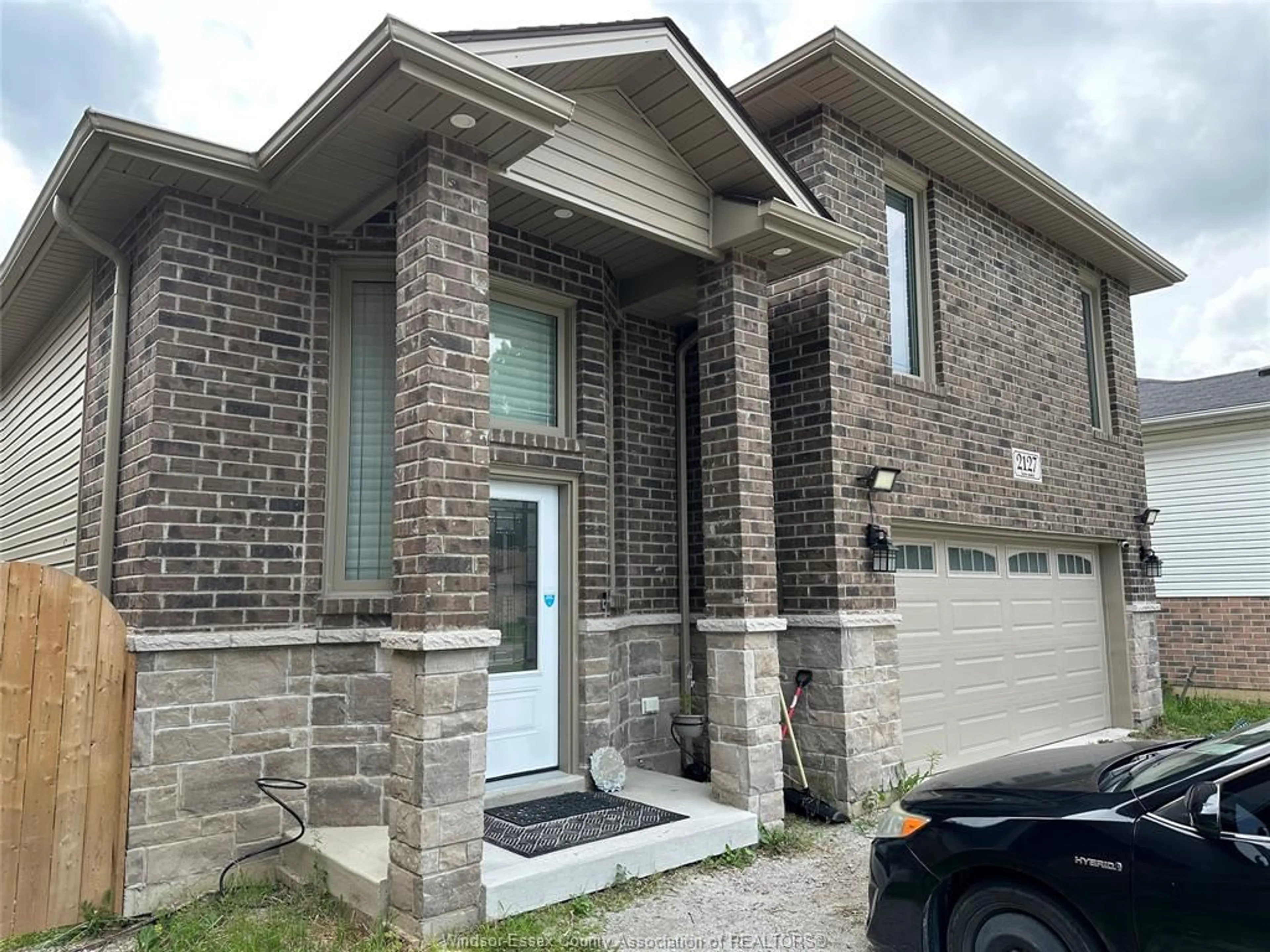 Home with brick exterior material, street for 2127 DOMINION Blvd, Windsor Ontario N9B 3H8