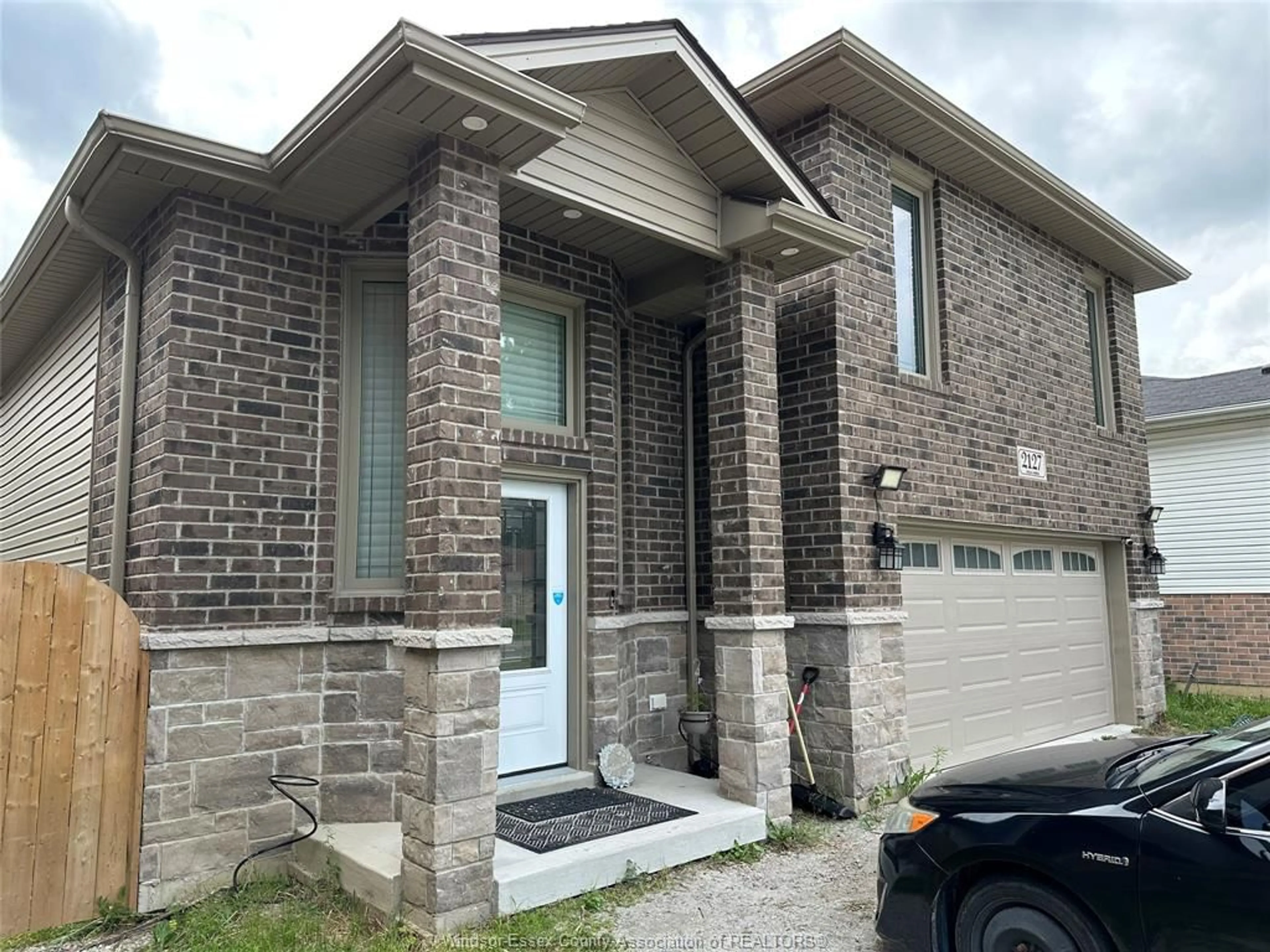 Home with brick exterior material, street for 2127 DOMINION Blvd, Windsor Ontario N9B 3H8