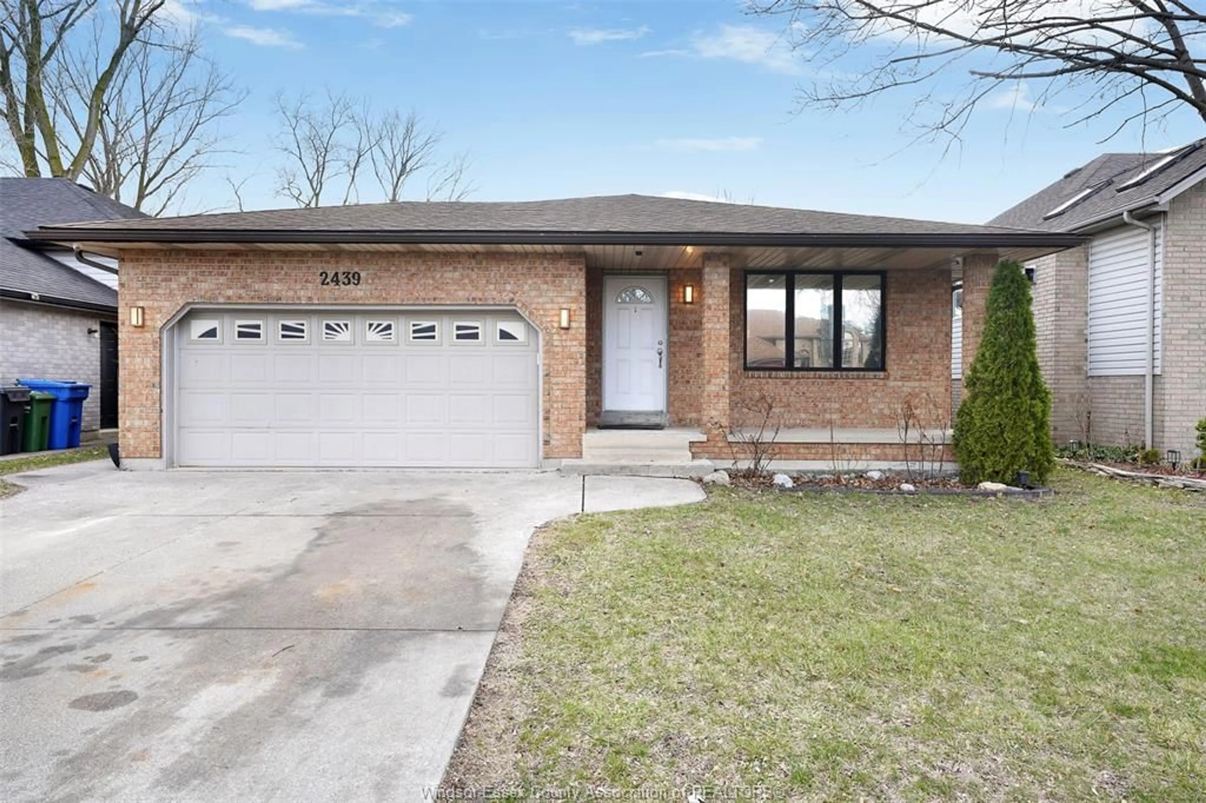 Home with brick exterior material, street for 2439 NORTHWOOD St, Windsor Ontario N9E 4N7