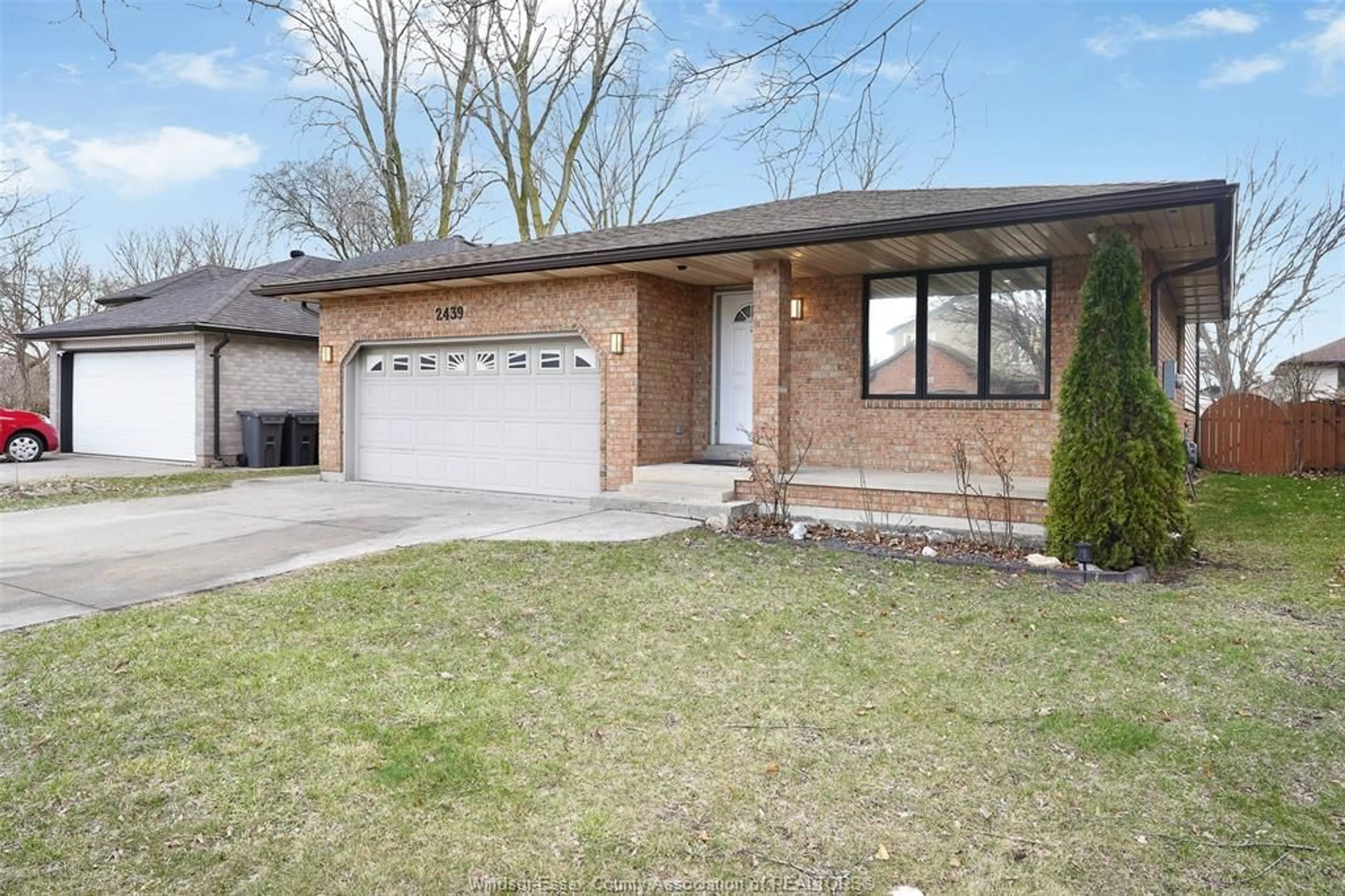 Home with brick exterior material, street for 2439 NORTHWOOD St, Windsor Ontario N9E 4N7