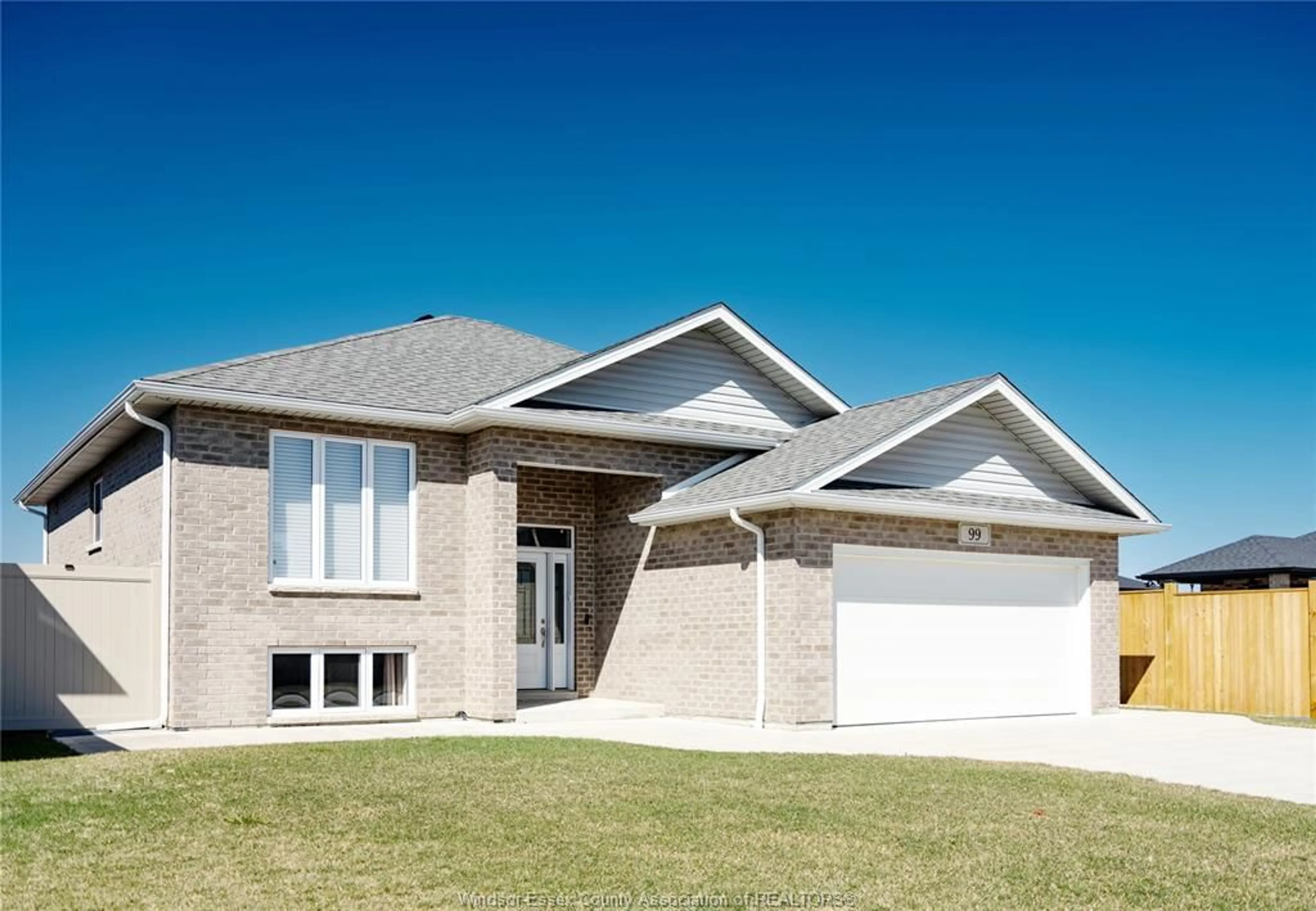 Home with brick exterior material, street for 99 Davis St, Amherstburg Ontario N9V 0B9