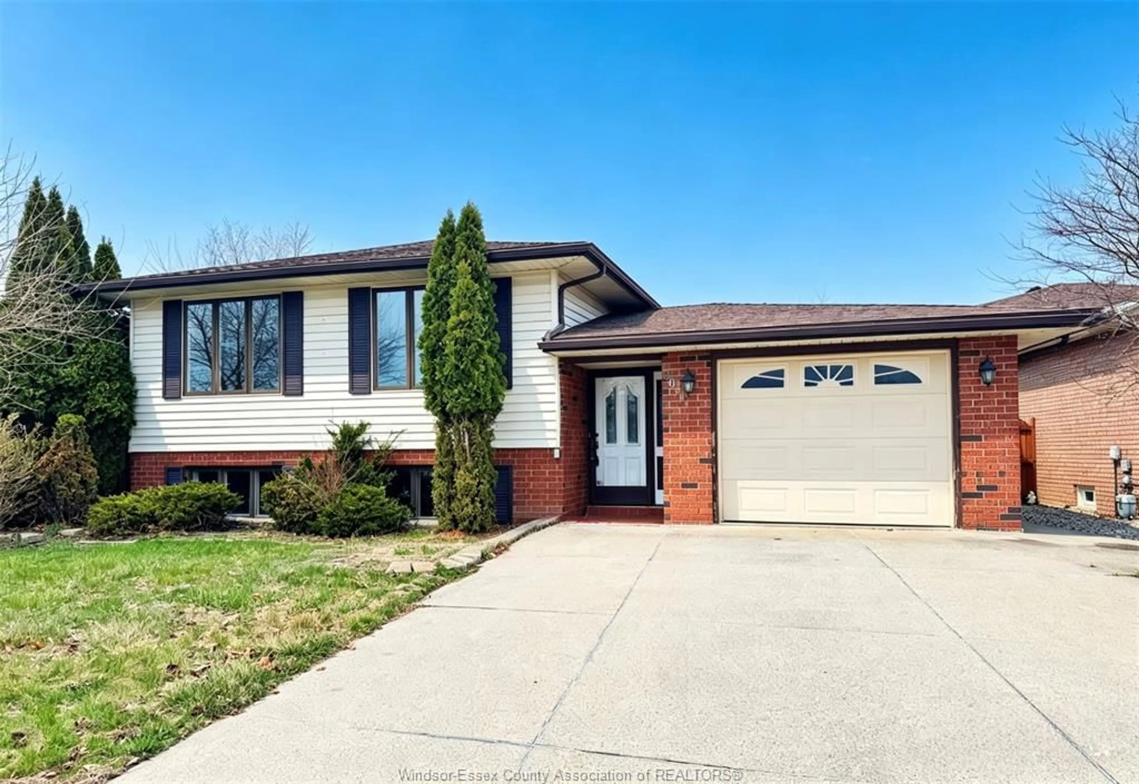 Home with brick exterior material, street for 3034 FAZIO Dr, Windsor Ontario N9E 4G1