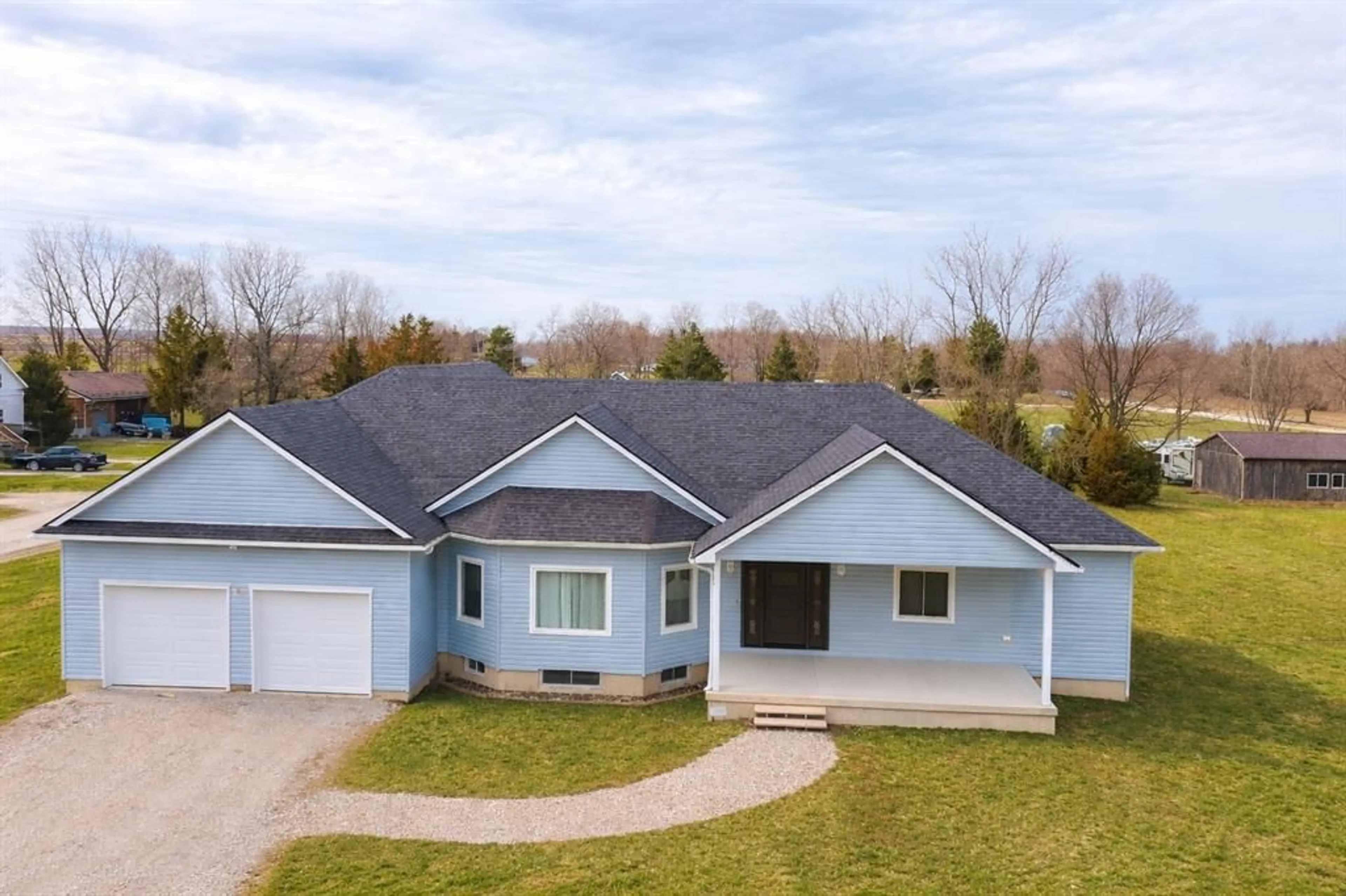 A pic from outside/outdoor area/front of a property/back of a property/a pic from drone, unknown for 3167 Broadway St, Brooke-Alvinston Ontario N0N 1A0