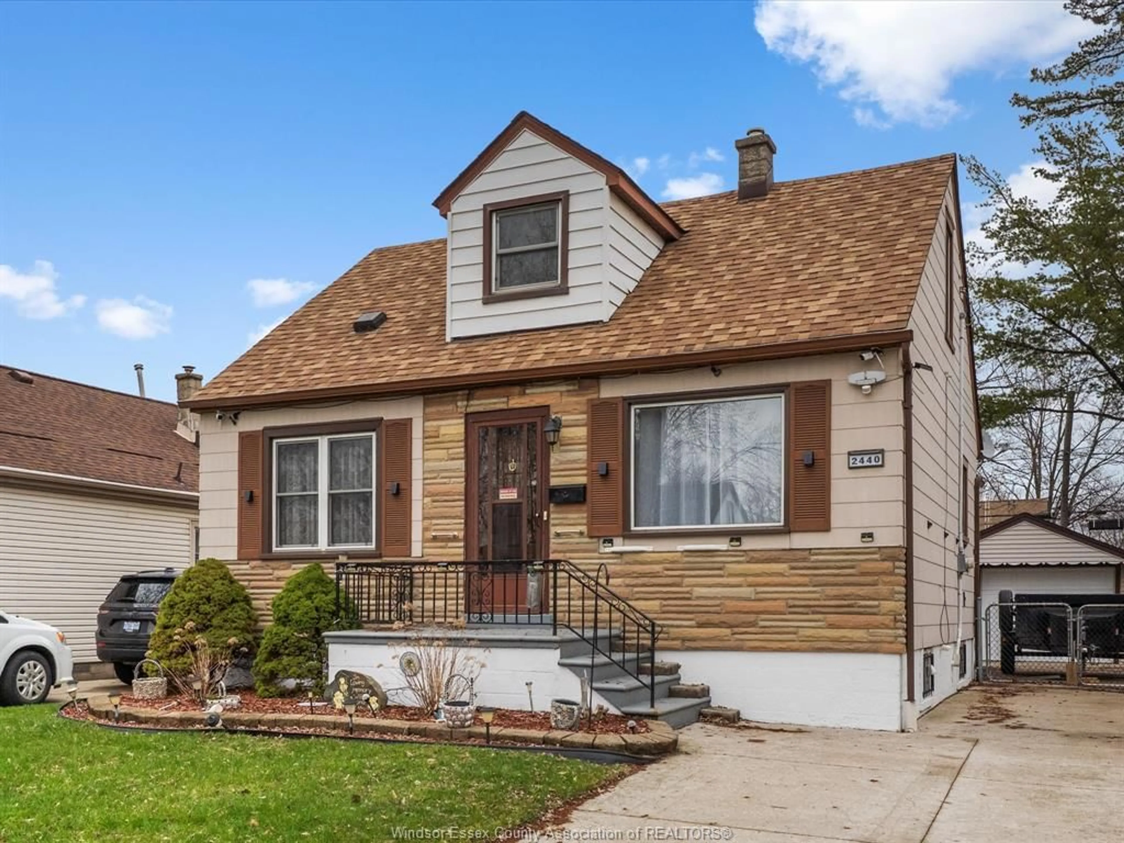 Home with vinyl exterior material, street for 2440 Alexis Rd, Windsor Ontario N8W 3Z5