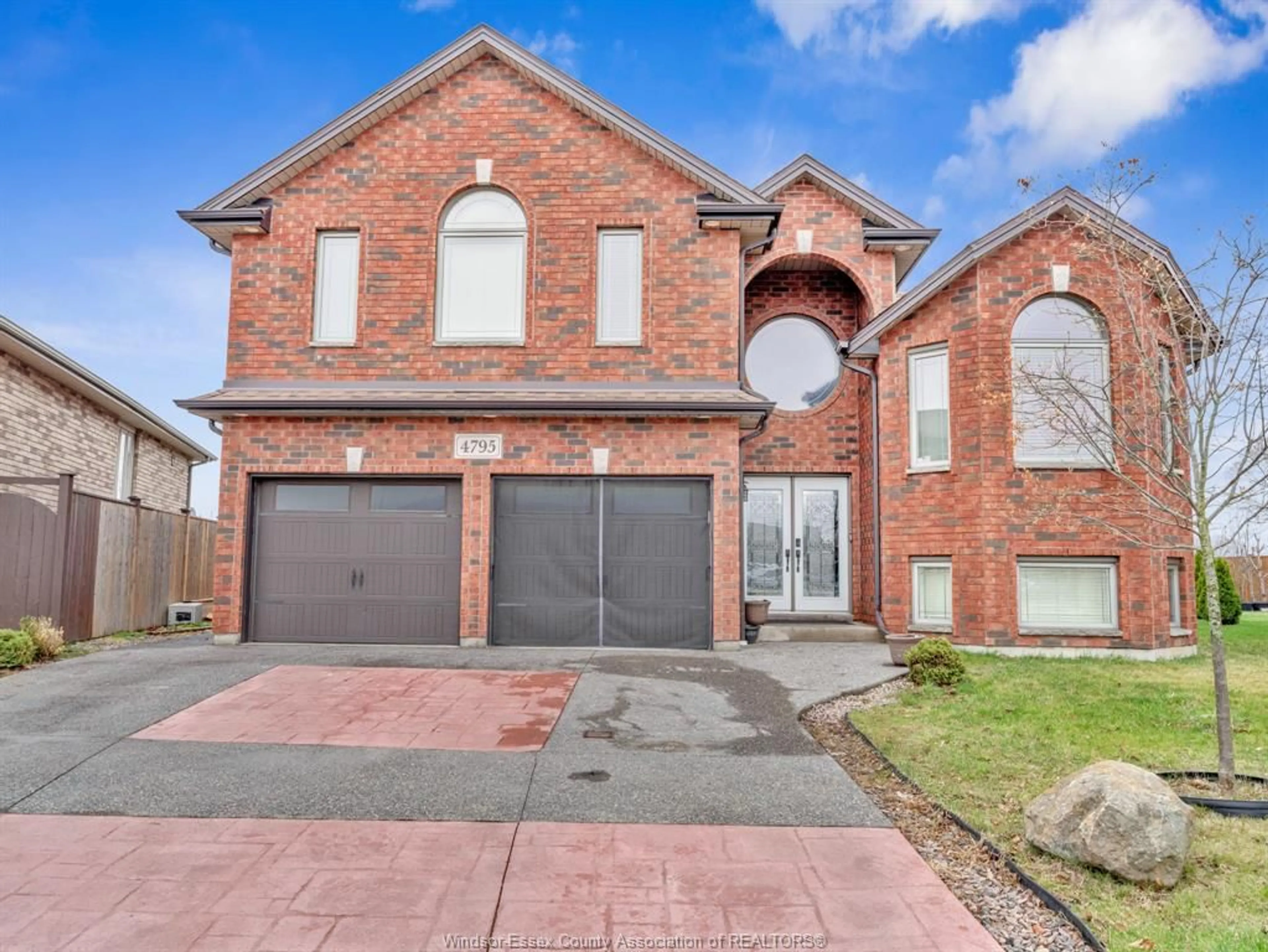 Home with brick exterior material, street for 4795 PERIWINKLE Cres, Windsor Ontario N9G 3G8
