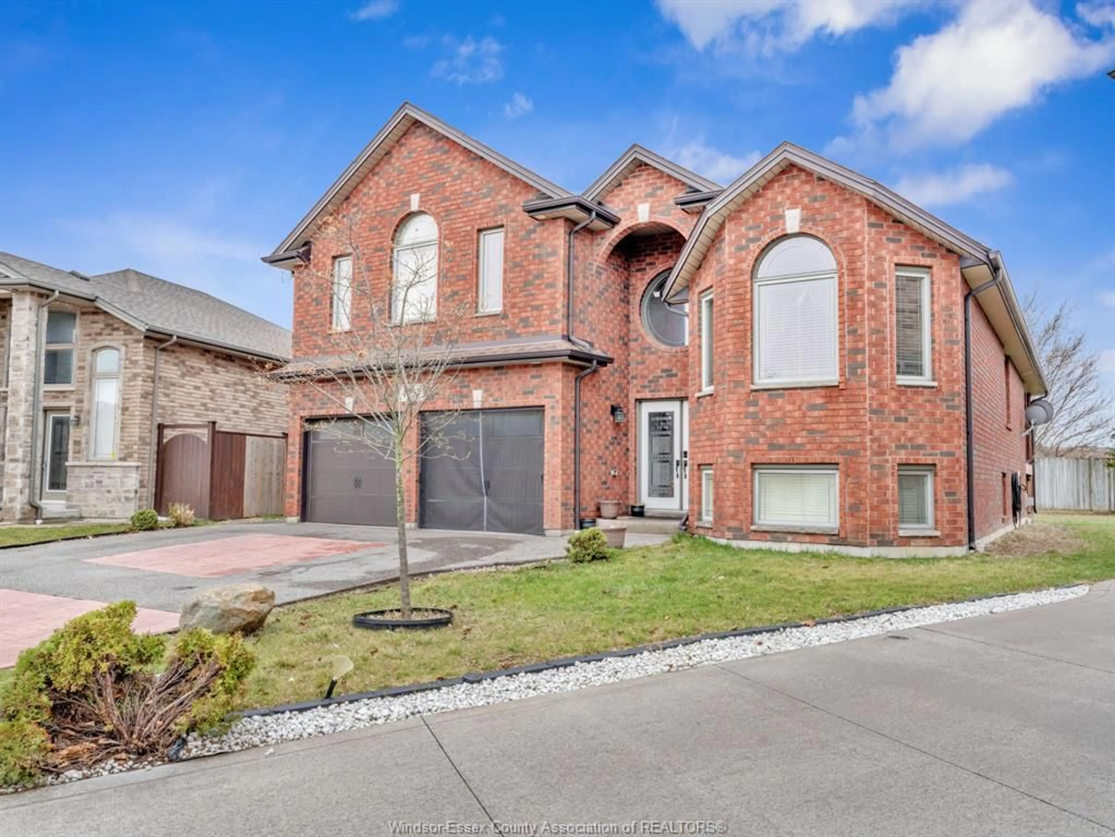 Home with brick exterior material, street for 4795 PERIWINKLE Cres, Windsor Ontario N9G 3G8