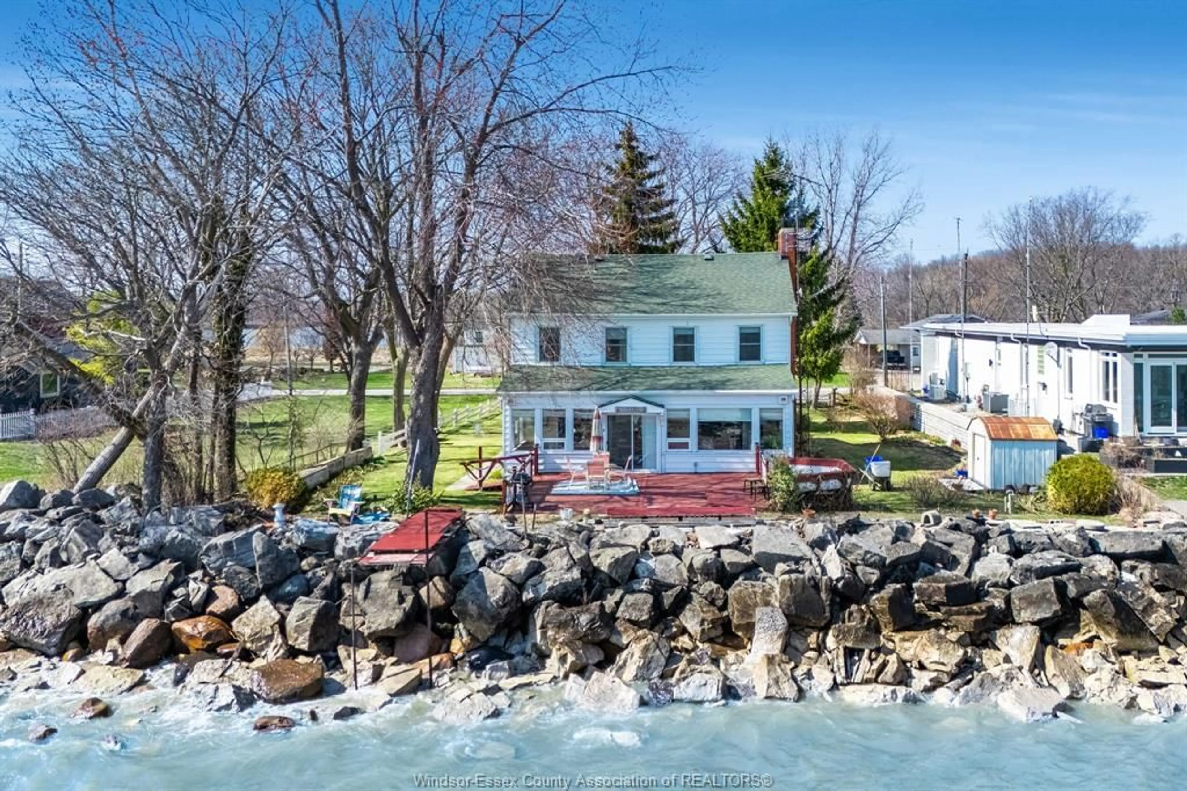 A pic from outside/outdoor area/front of a property/back of a property/a pic from drone, water/lake/river/ocean view for 1247 Heritage Rd, Kingsville Ontario N9Y 2E6