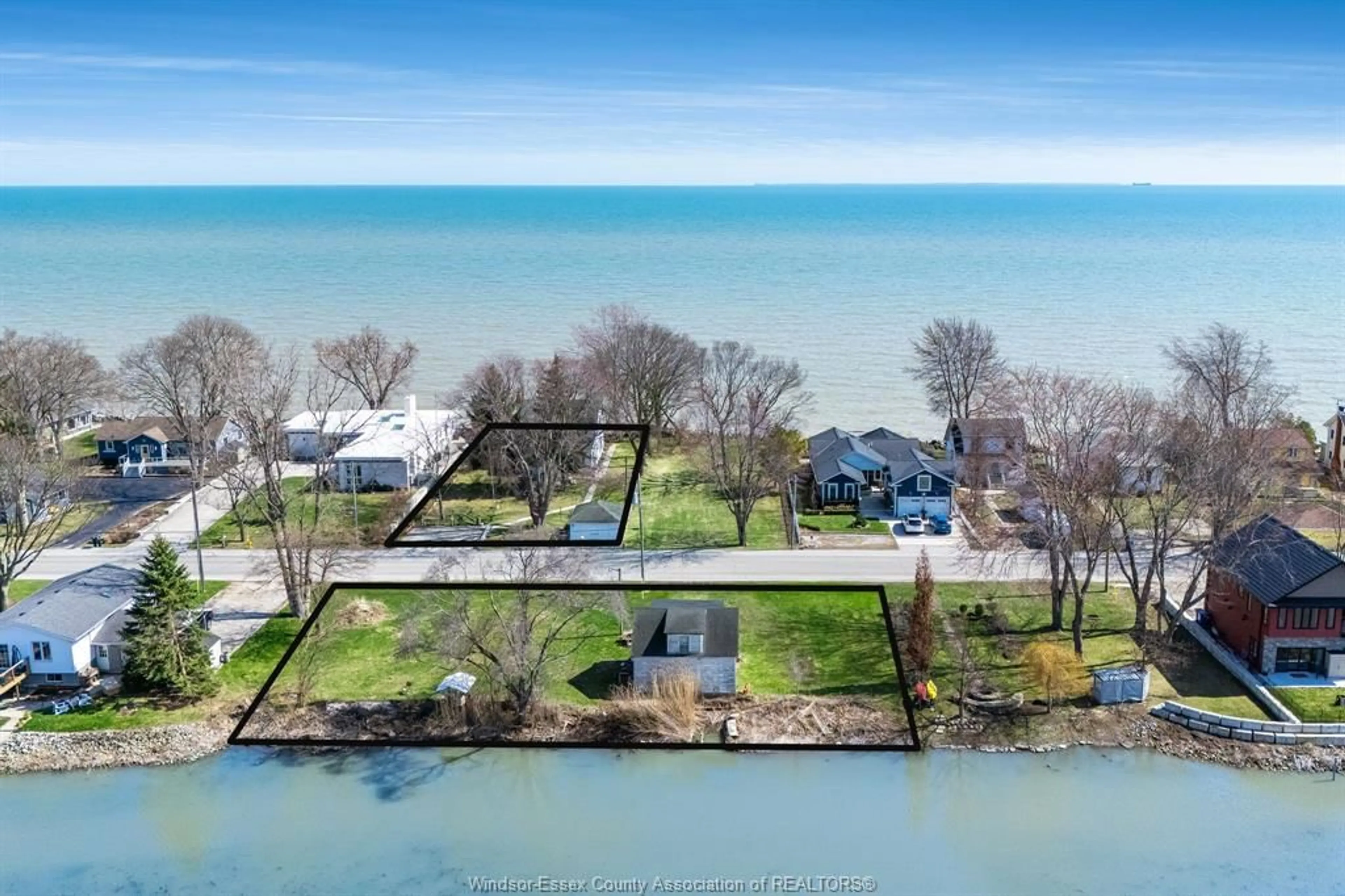 A pic from outside/outdoor area/front of a property/back of a property/a pic from drone, water/lake/river/ocean view for 1247 Heritage Rd, Kingsville Ontario N9Y 2E6