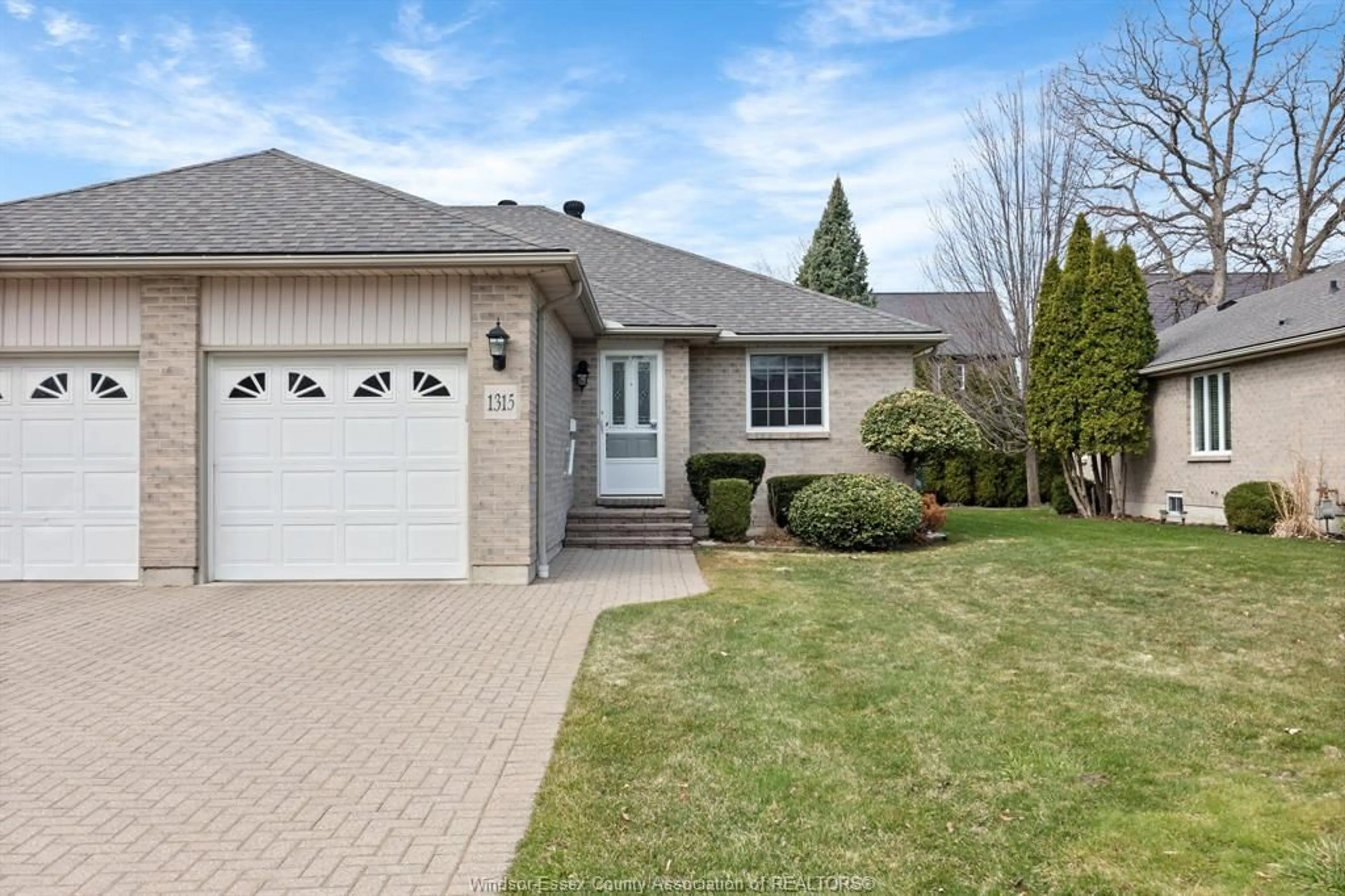 Home with vinyl exterior material, street for 1315 RENDEZVOUS, Windsor Ontario N8P 1K7