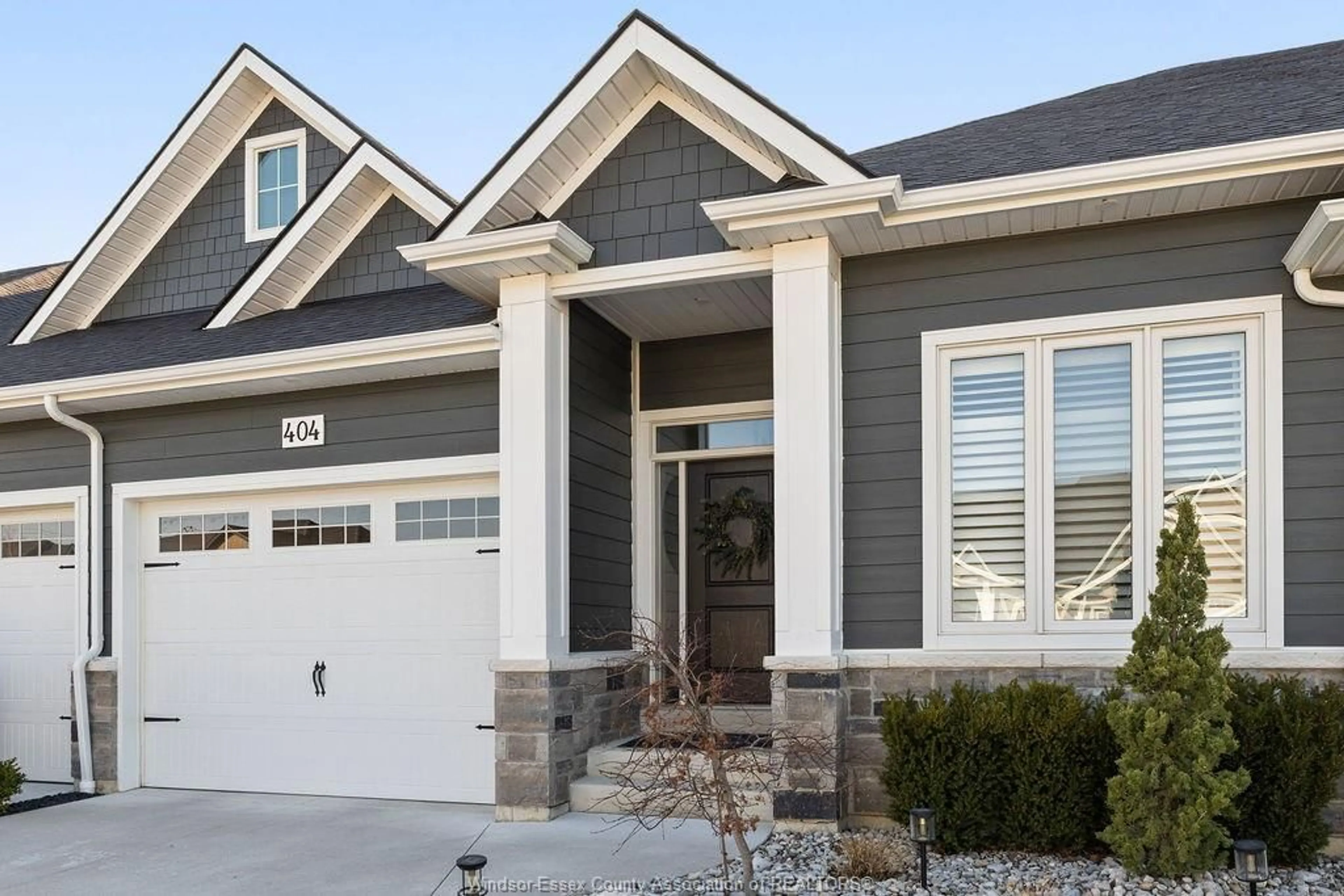 Home with vinyl exterior material, street for 404 MATESE St, Lakeshore Ontario N8L 0A5