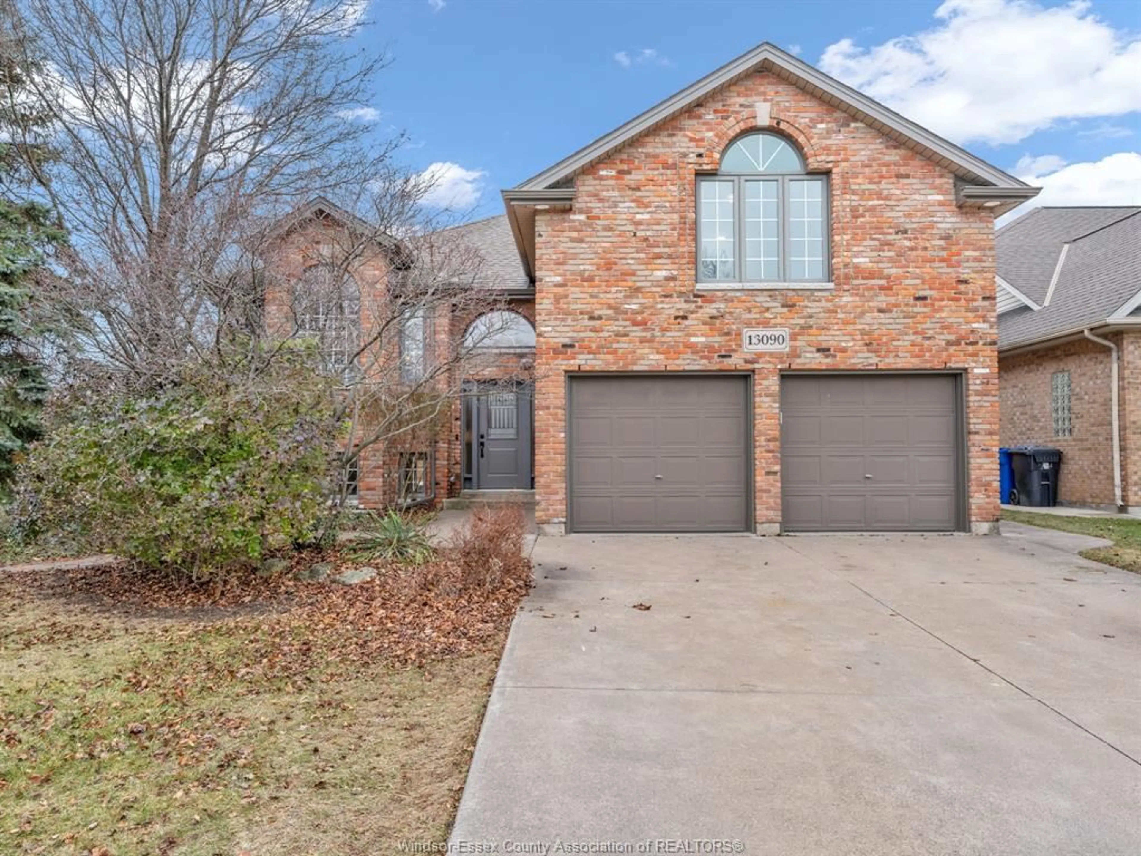 Home with brick exterior material, street for 13090 PARKLAND Cres, Tecumseh Ontario N8N 4V6