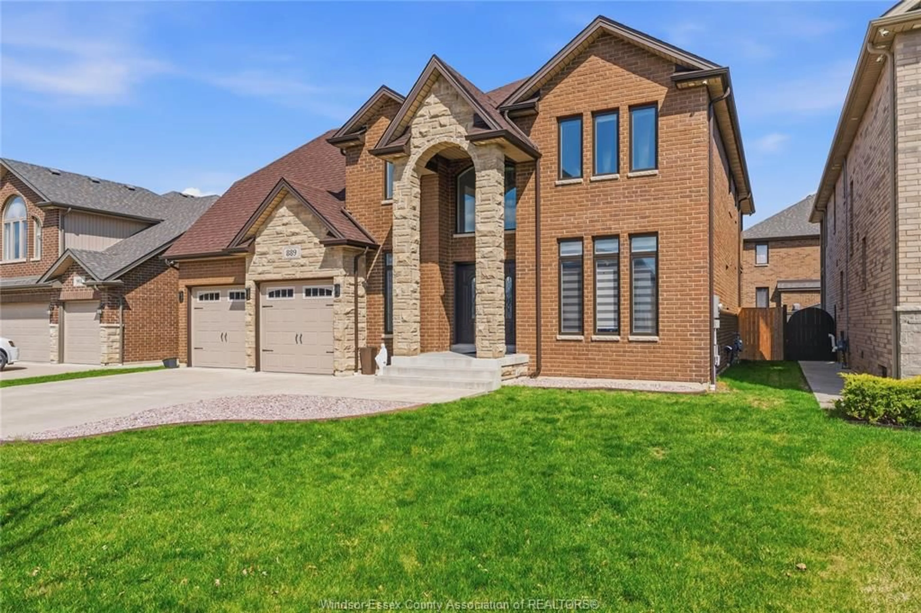 Home with brick exterior material, street for 889 LAKEWOOD, Lakeshore Ontario N0R 1A0