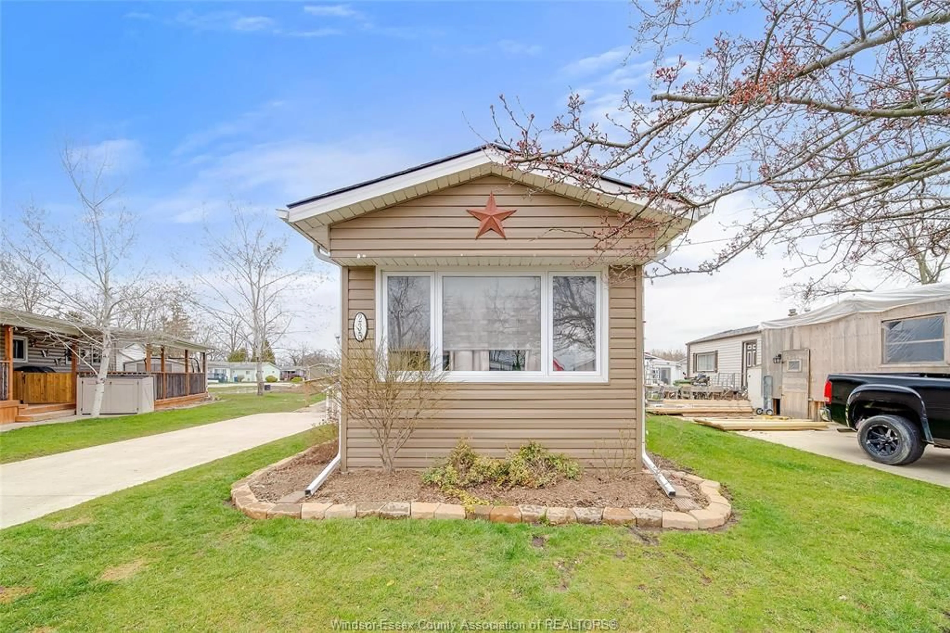 Home with vinyl exterior material, street for 235 DAVID Crt, Essex Ontario N8M 2B2